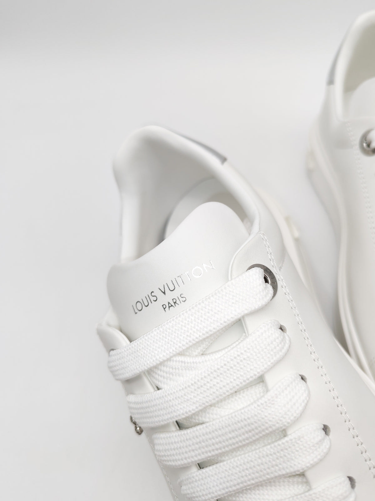 Louis Vuitton Time Out Sneaker in White with Silver Rhinestone Logo Size 38 EU (25.5 cm)