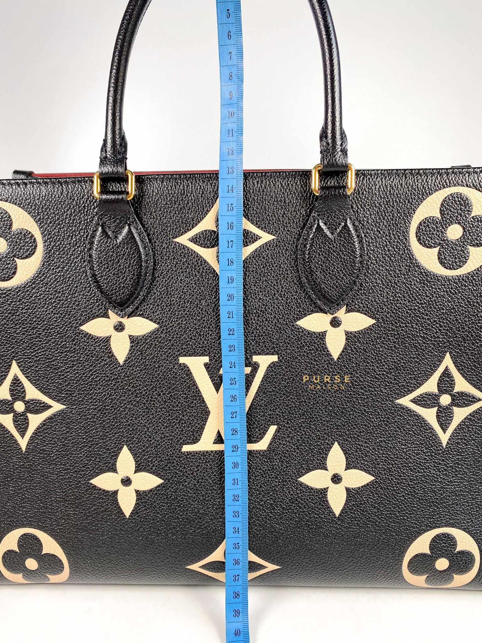 Louis Vuitton OnTheGo (OTG) MM Empreinte Monogram Leather Black/Beige (Microchip)
