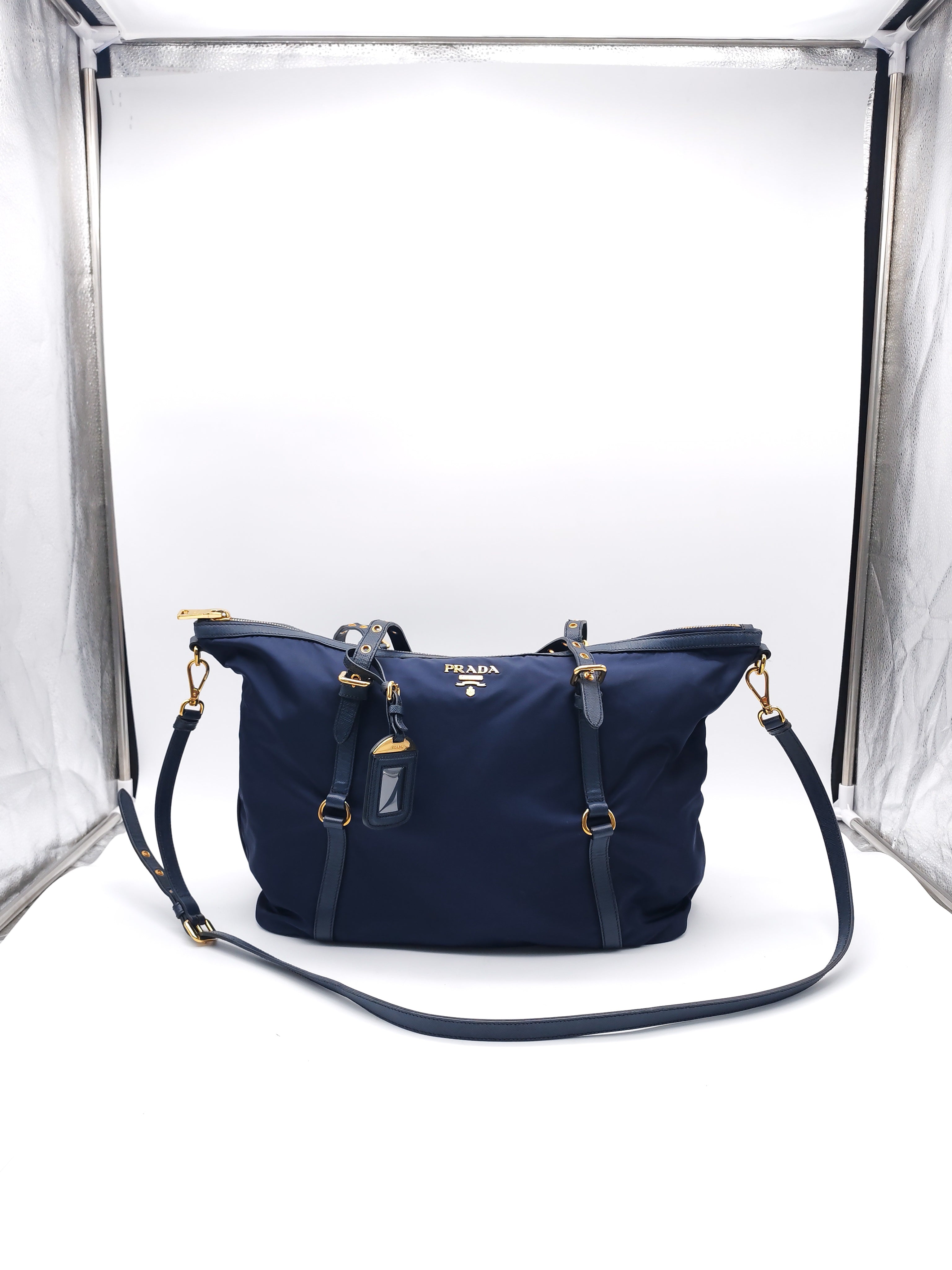PRADA TESSUTO NYLON AND SAFFIANO HAND BAG IN NAVY BLUE
