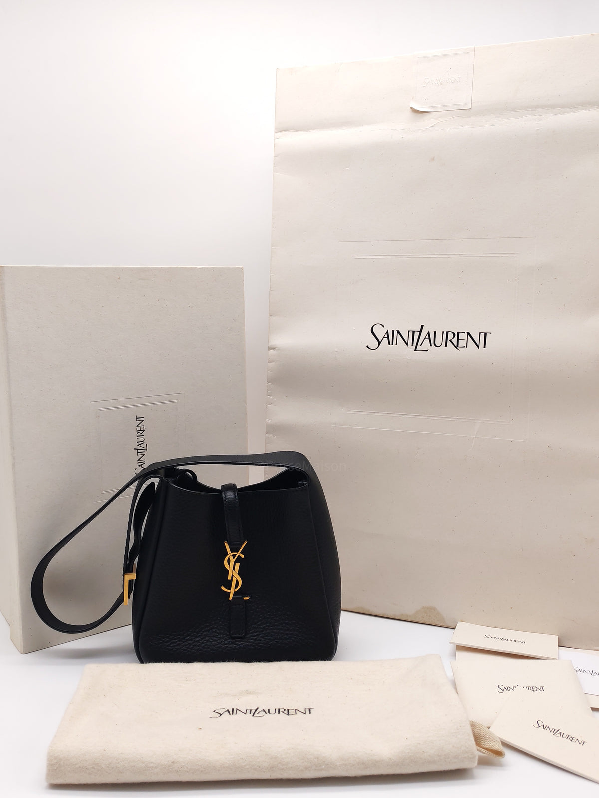 Yves Saint Laurent Le 5 à 7 Supple Baby Hobo Bag in Black Grained Calfskin Leather and Gold Hardware