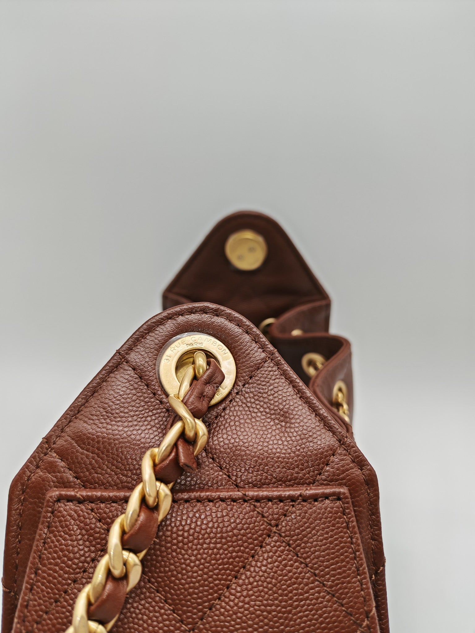 Chanel 25 Mini Chocolate Brown Caviar Leather and Aged Gold Hardware Microchip