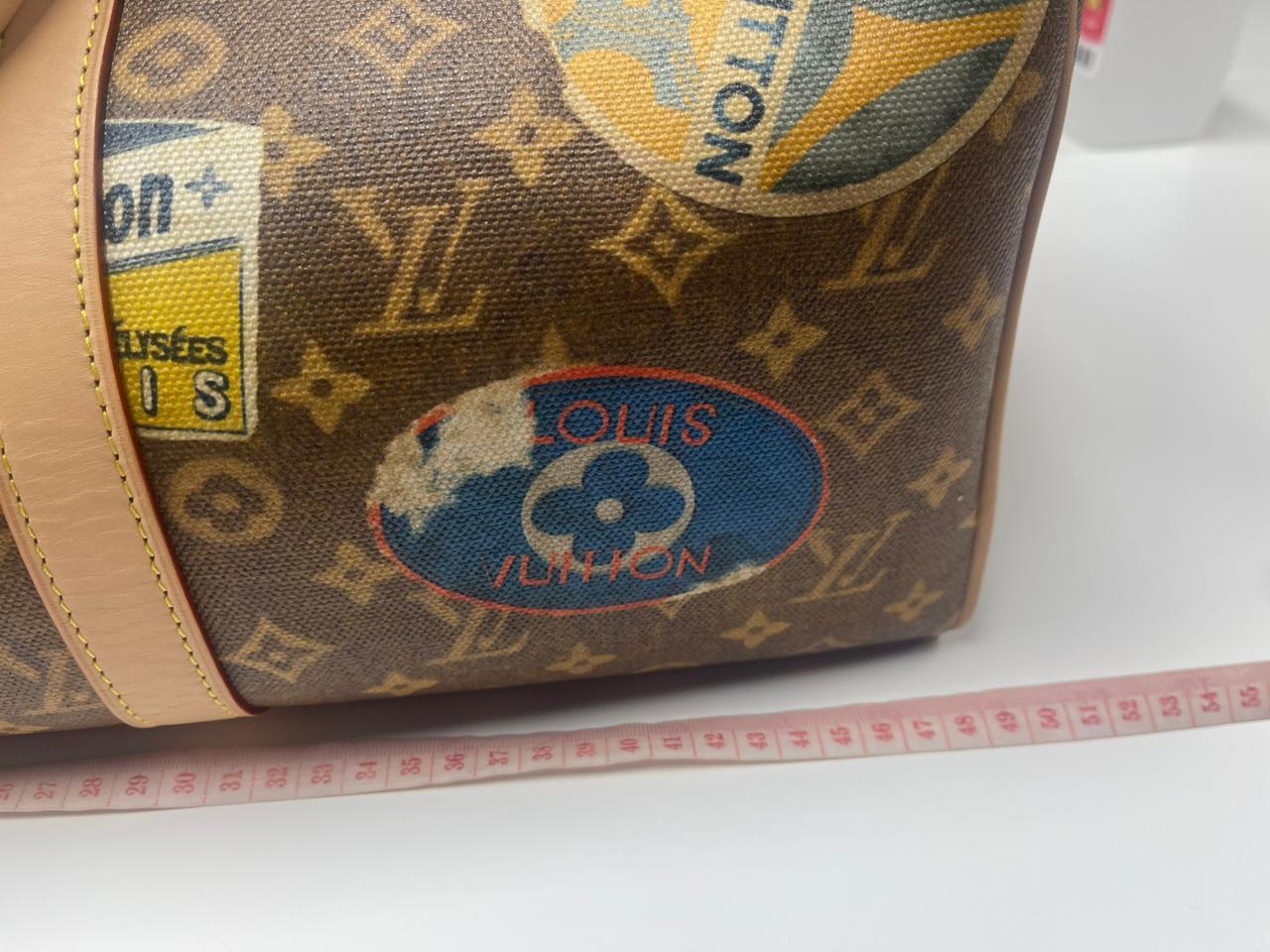 Louis Vuitton Keepall Bandouliere Flight Mode Collection in Monogram Canvas Cowhide Leather and Gold Hardware Microchip