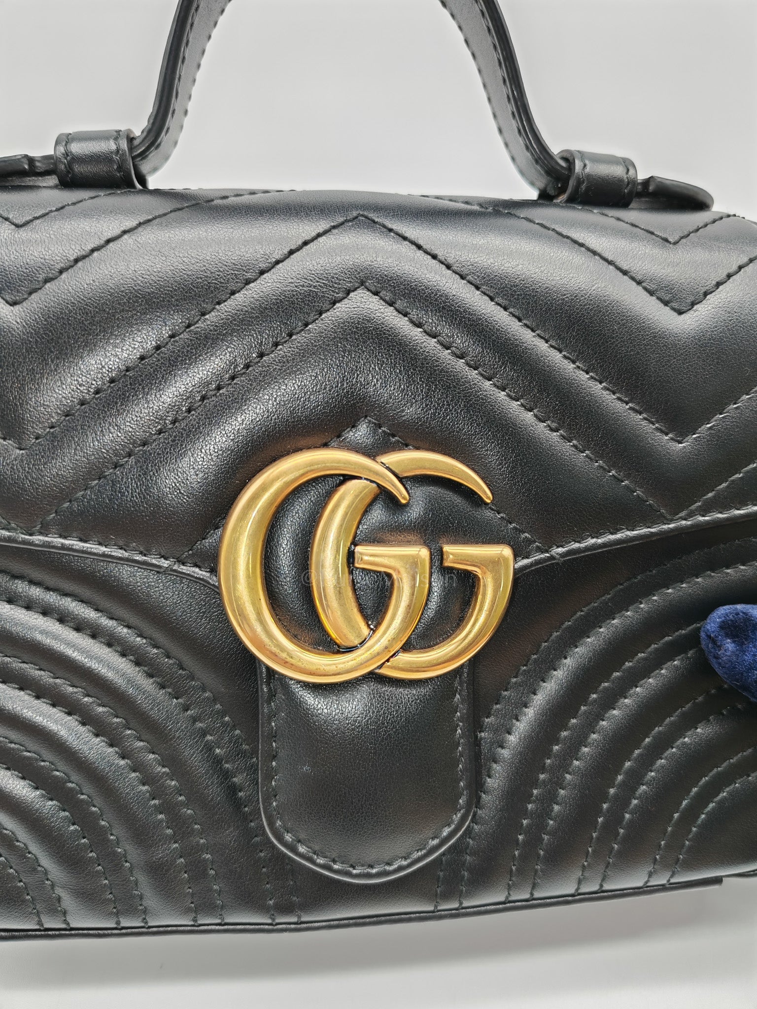 GG Marmont Mini Top Handle Bag in Black Matelasse Chevron Quilted Calfskin Leather & Aged Gold Hardware