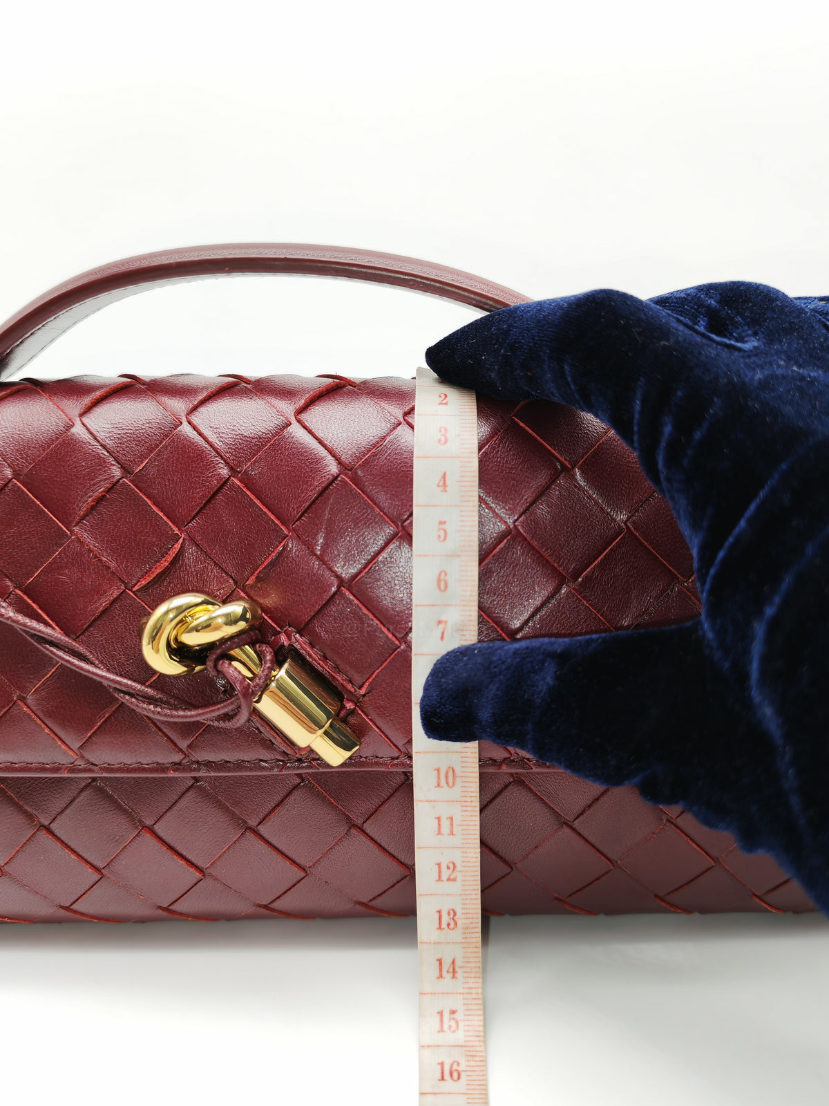 Bottega Veneta Andiamo Clutch in Barolo Woven Intrecciato Lambskin Leather and Gold Hardware