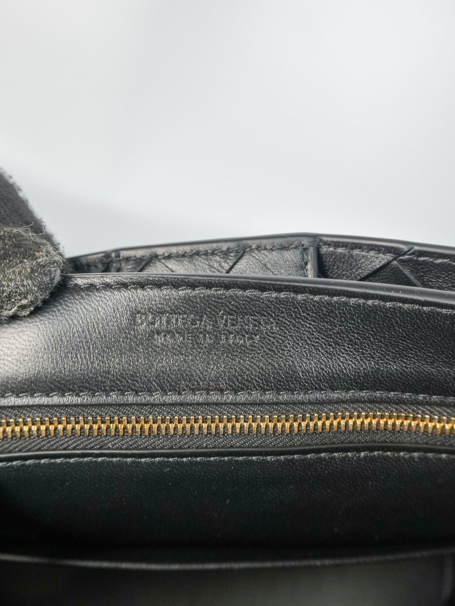Andiamo in Small Black Intrecciato Leather | Purse Maison Luxury Bags Shop
