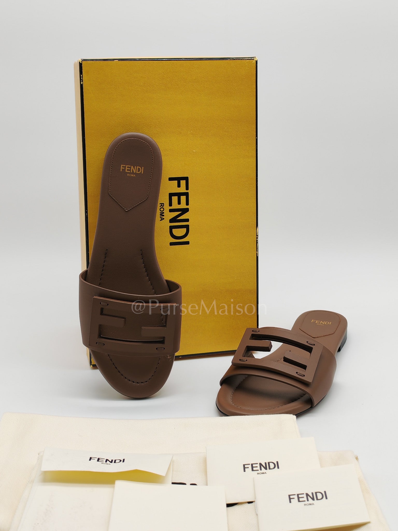Baguette Slides in Brown Leather Size 37 EU (24 cm) | Purse Maison Luxury Bags Shop
