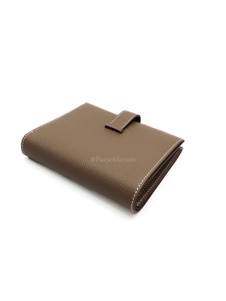Bearn Bifold in Etoupe Epsom Leather and Gold Hardware Stamp K (2025) | Purse Maison Luxury Bags Shop