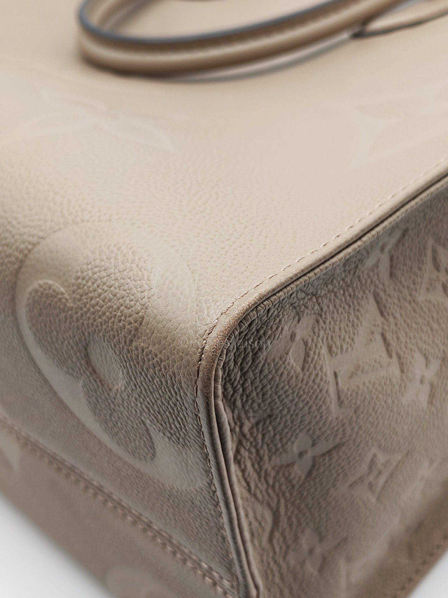OnTheGo MM (OTG) in Beige Monogram Empriente Leather & Gold Hardware Microchip