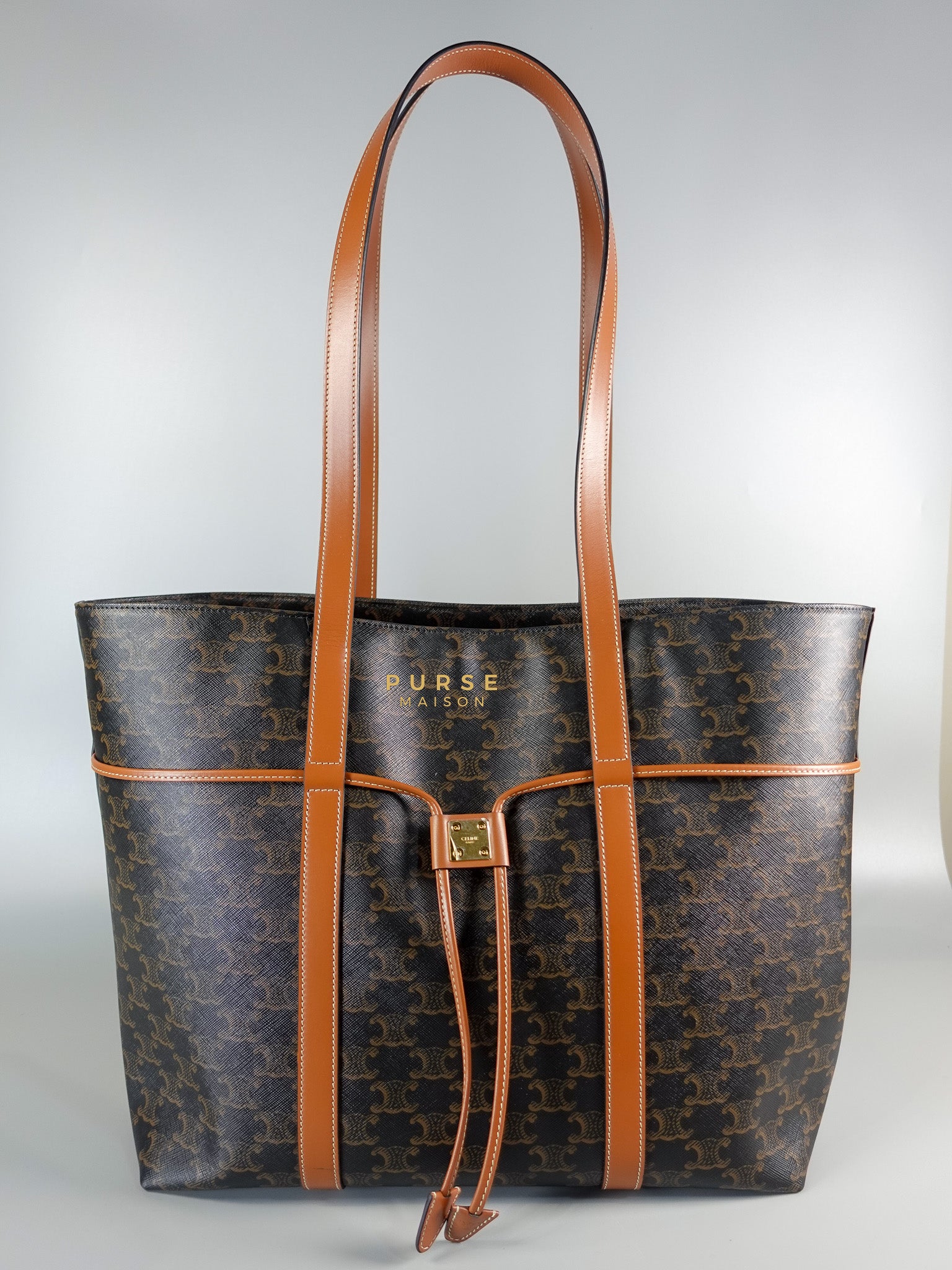 Cabas Drawstring in Triomphe Canvas and Calfskin Leather