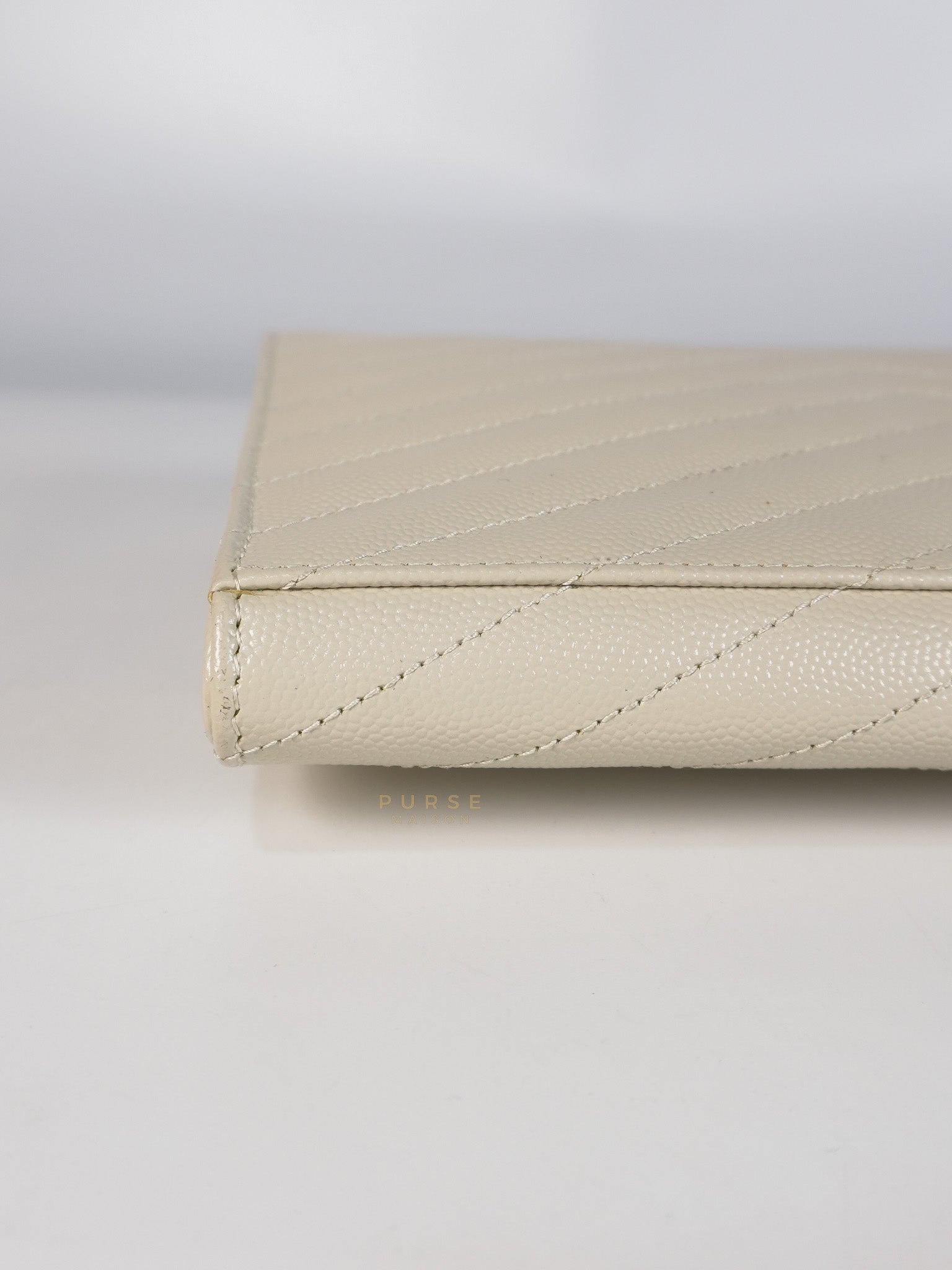 Cassandre Matelassé Flap Pouch in White Grain De Poudre Leather | Purse Maison Luxury Bags Shop