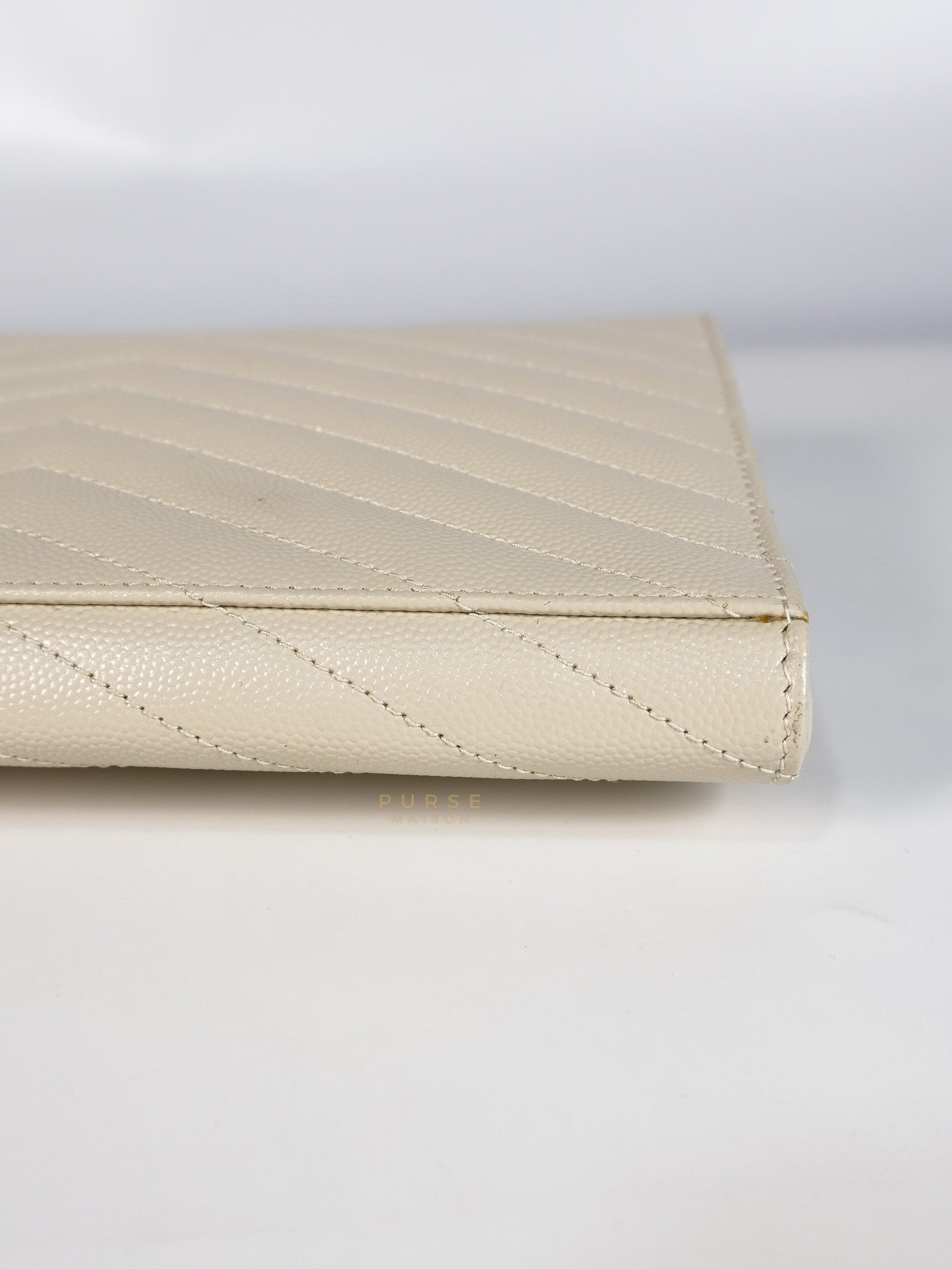 Cassandre Matelassé Flap Pouch in White Grain De Poudre Leather | Purse Maison Luxury Bags Shop