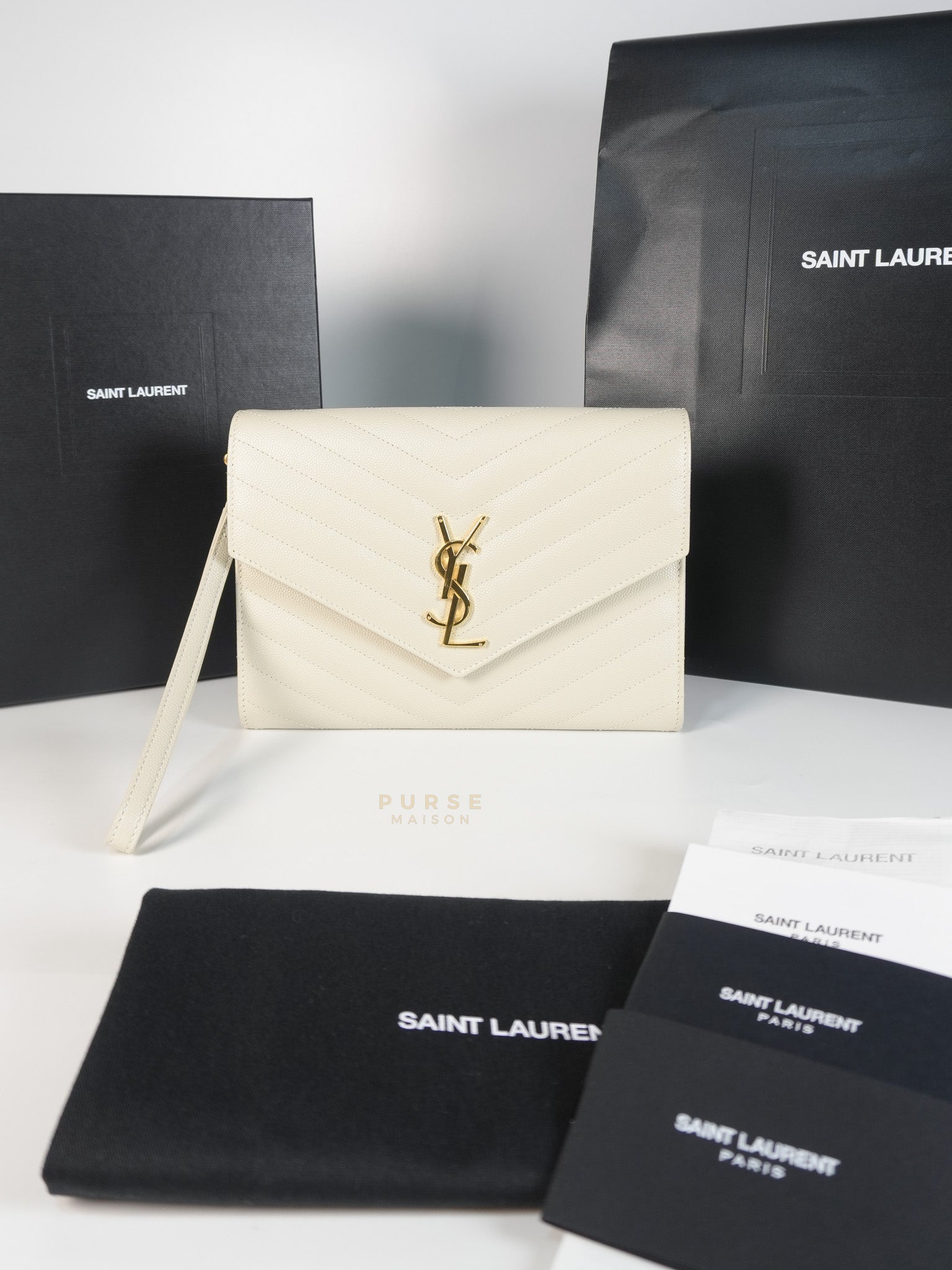 Cassandre Matelassé Flap Pouch in White Grain De Poudre Leather | Purse Maison Luxury Bags Shop