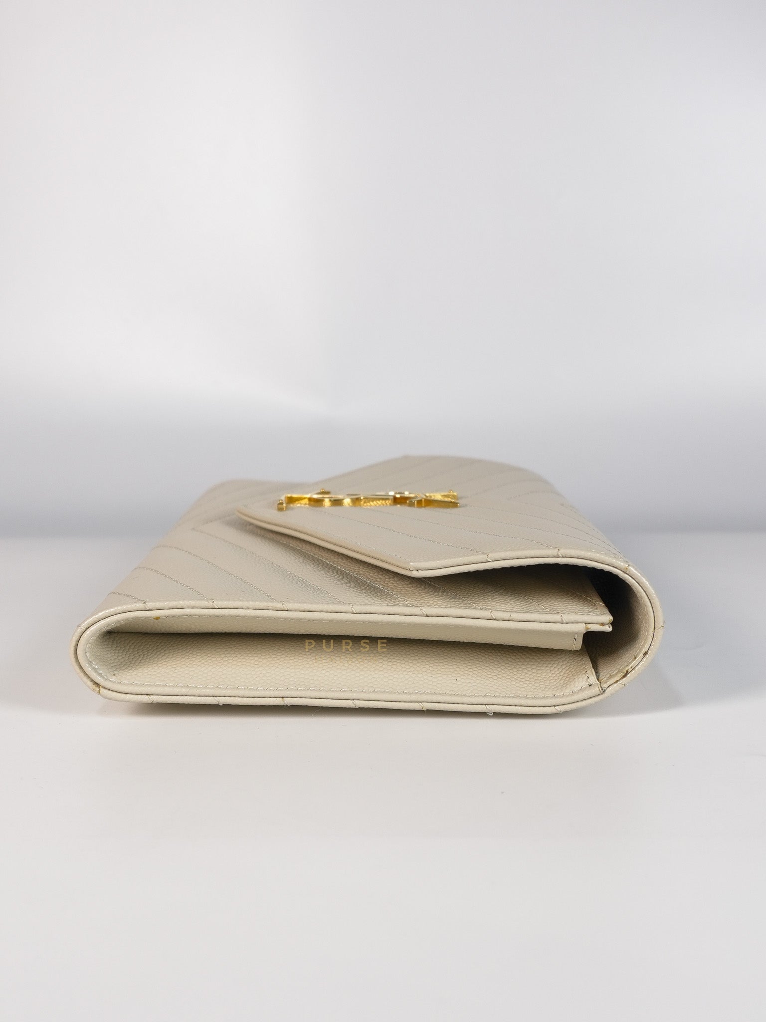 Cassandre Matelassé Flap Pouch in White Grain De Poudre Leather | Purse Maison Luxury Bags Shop