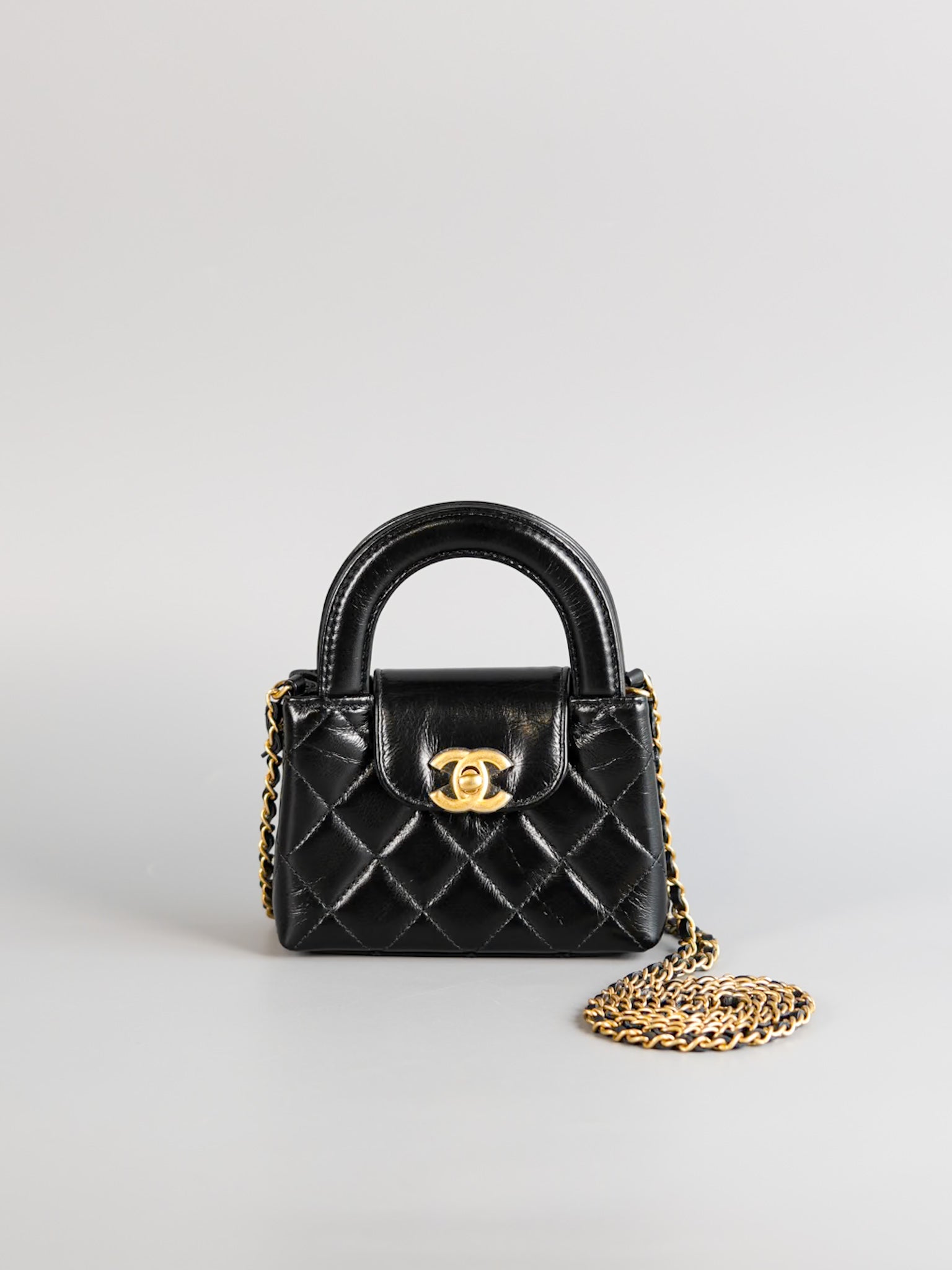 CC Kelly Nano Shopping Bag Black Calfskin & Aged Gold Hardware (Microchip) | Purse Maison Luxury Bags Shop