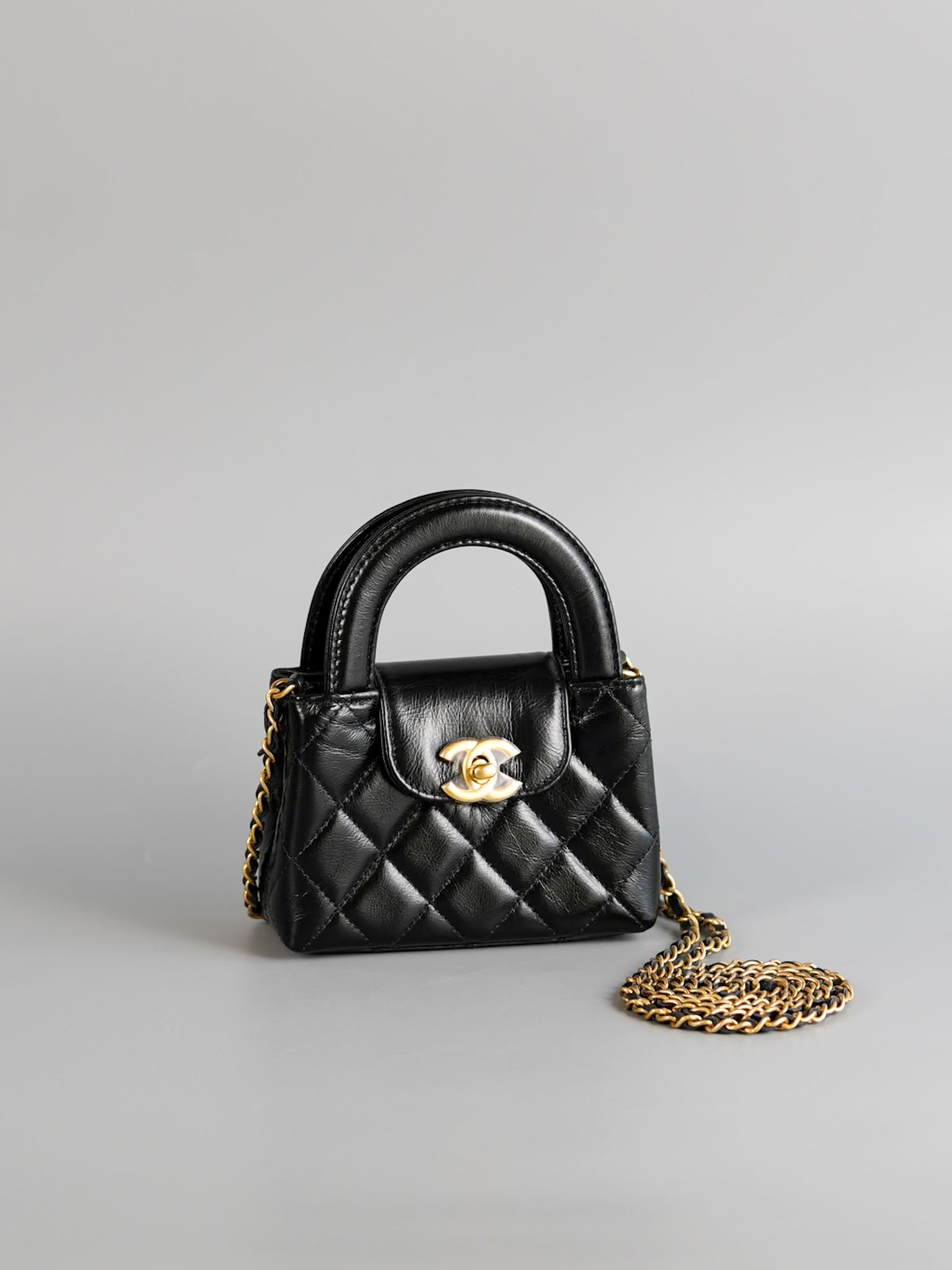 CC Kelly Nano Shopping Bag Black Calfskin & Aged Gold Hardware (Microchip) | Purse Maison Luxury Bags Shop