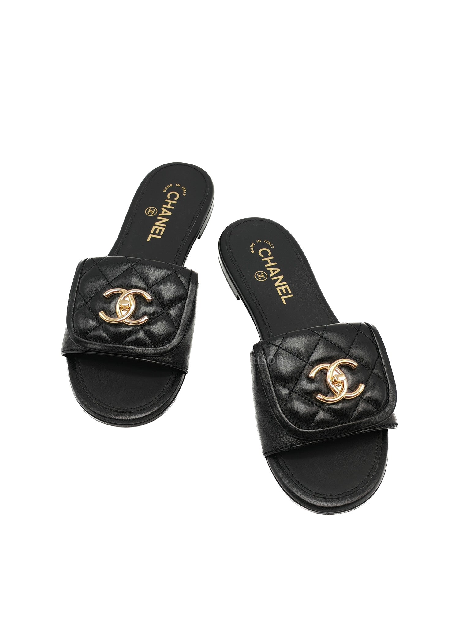 Chanel Turnlock Flat Mule Sandals in Black Quilted Lambskin Leather Size 37.5 EU(24cm)