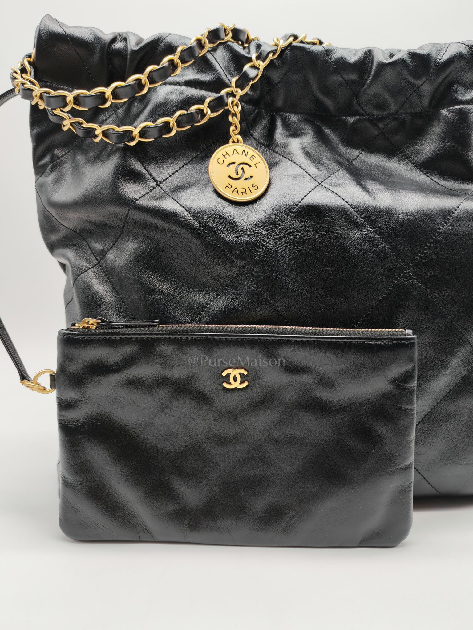 22 Medium in Black Quilted Goatskin Leather and Aged Gold Hardware (Microchip) | Purse Maison Luxury Bags Shop