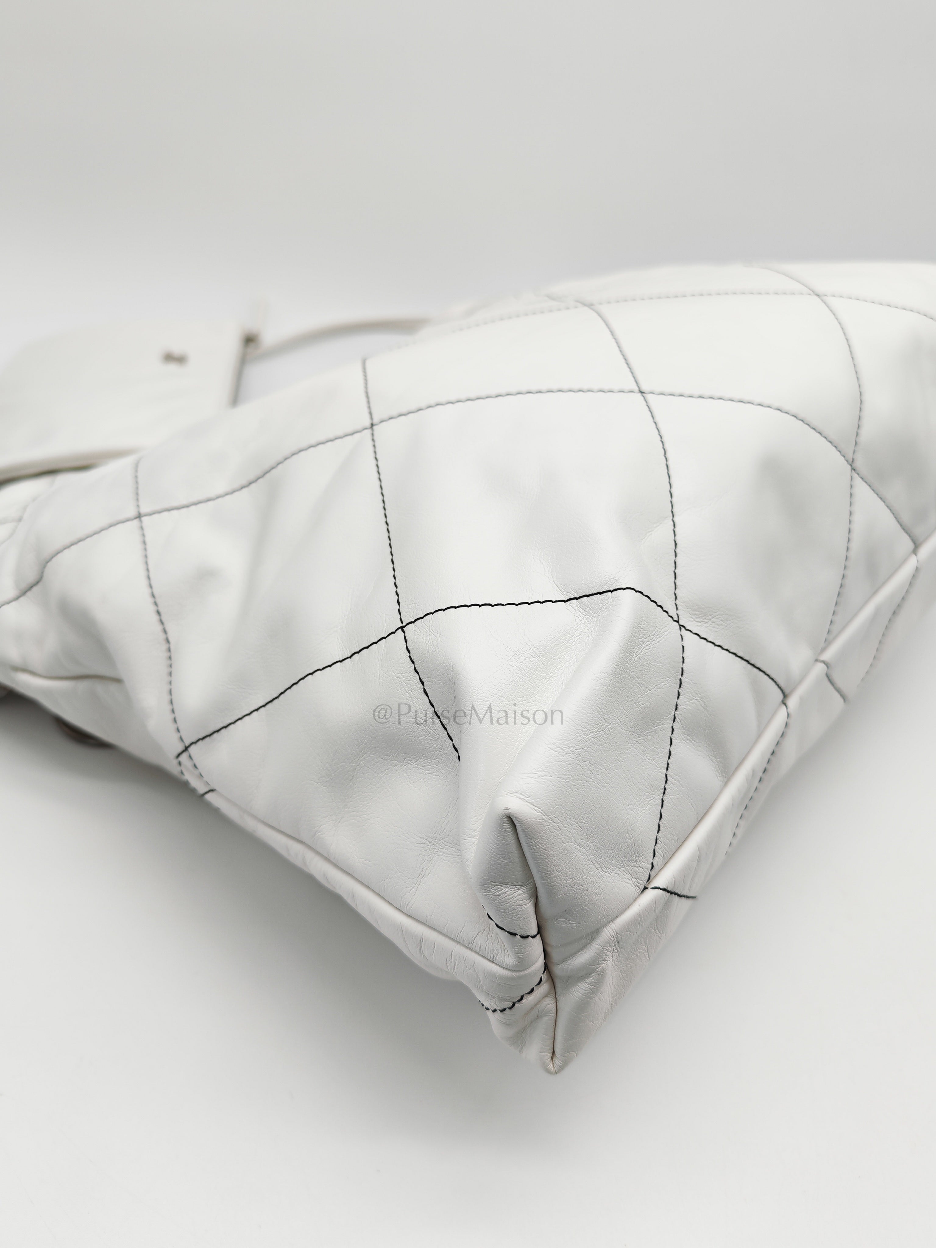 22 in White Quilted Calfskin Leather & Silver Hardware Microchip | Purse Maison Luxury Bags Shop
