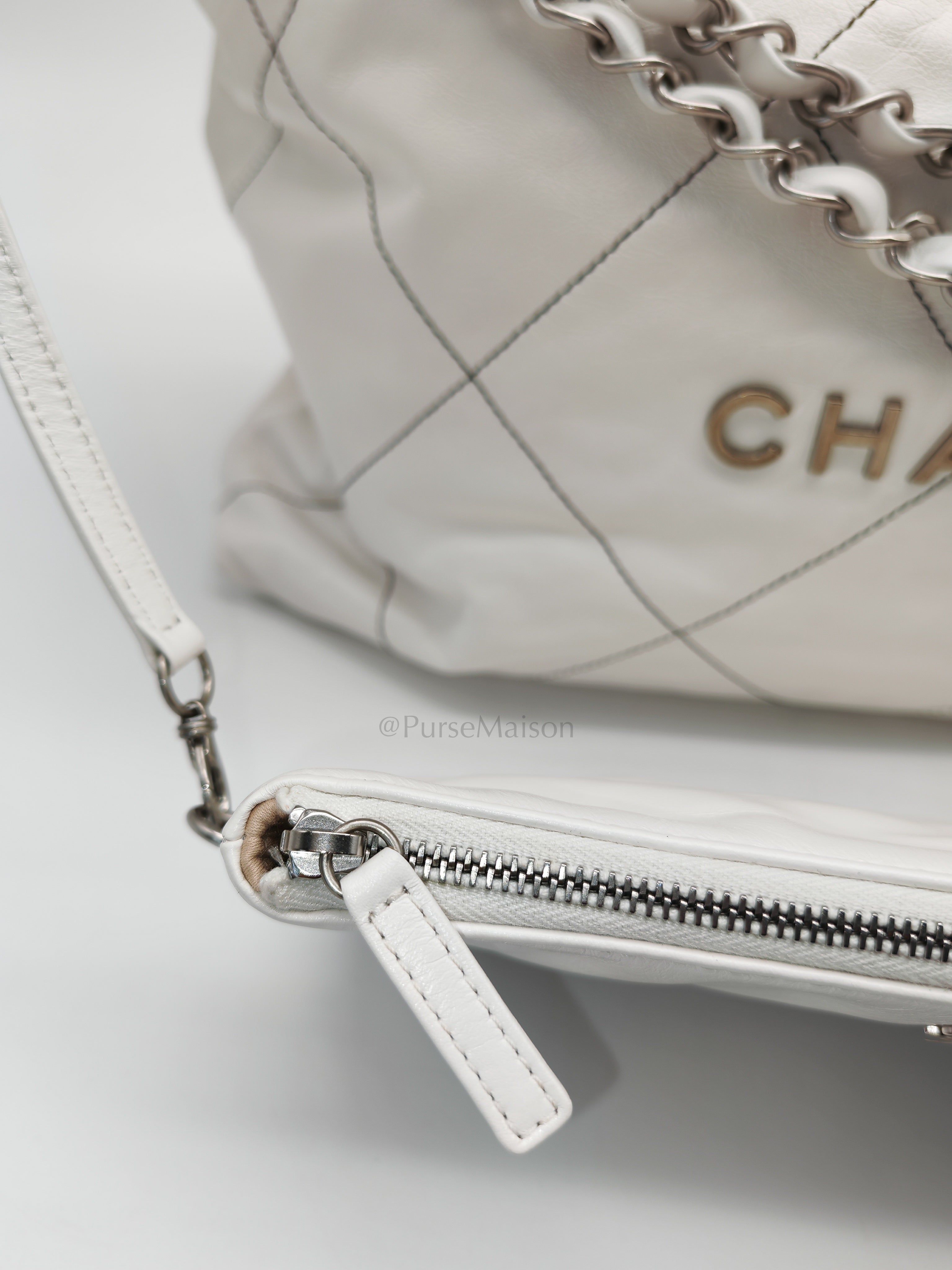22 in White Quilted Calfskin Leather & Silver Hardware Microchip | Purse Maison Luxury Bags Shop