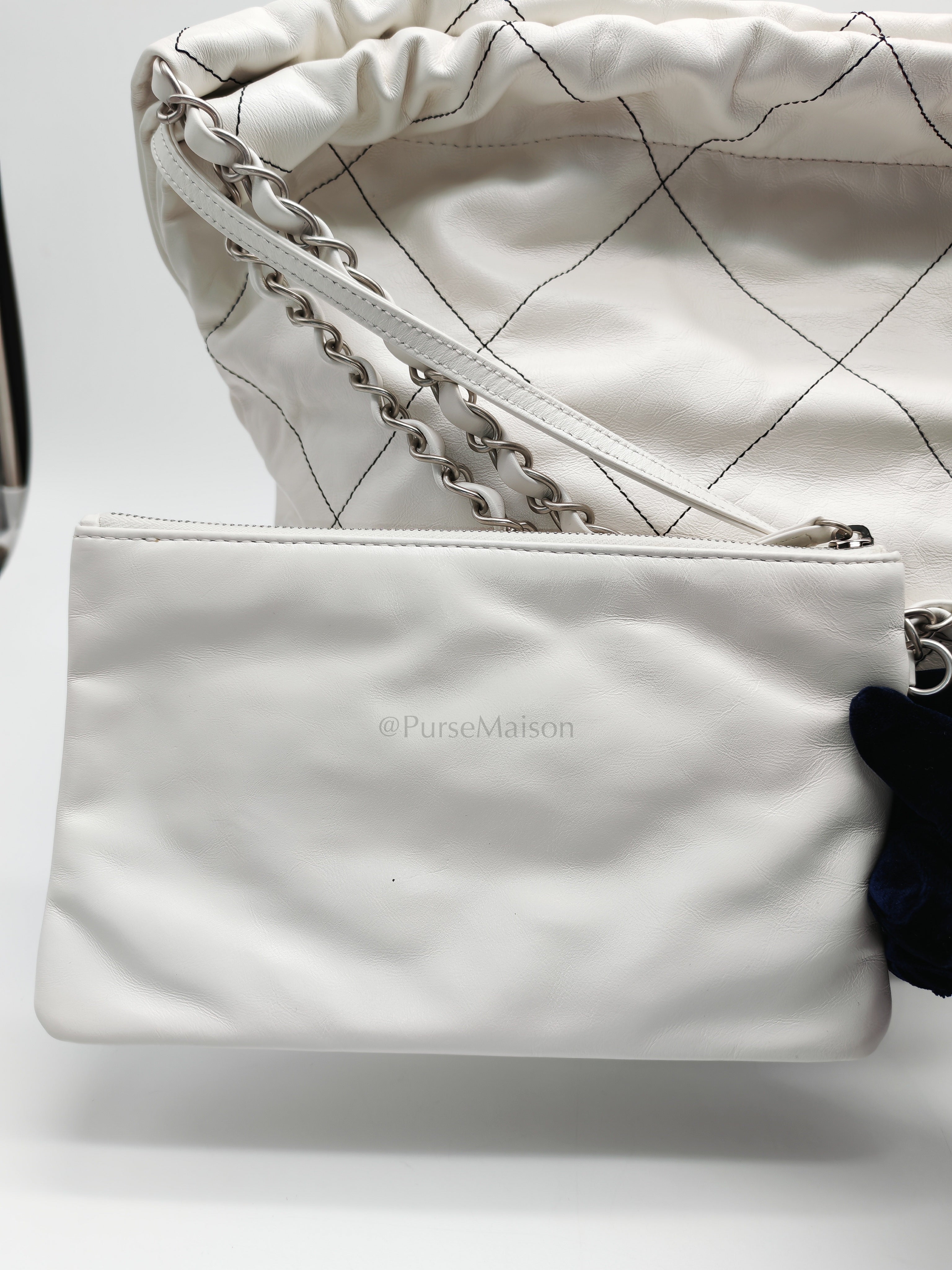22 in White Quilted Calfskin Leather & Silver Hardware Microchip | Purse Maison Luxury Bags Shop