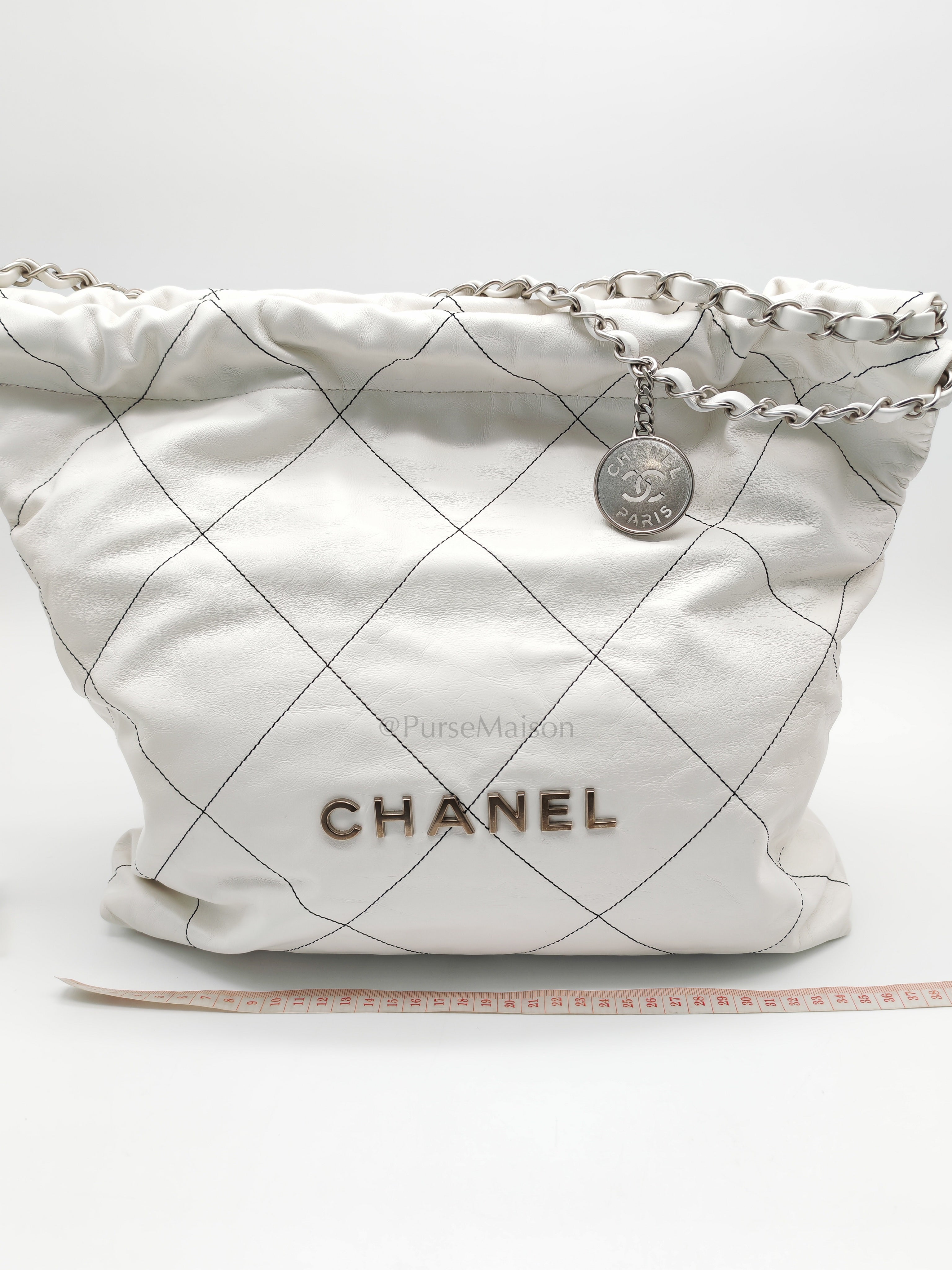 22 in White Quilted Calfskin Leather & Silver Hardware Microchip | Purse Maison Luxury Bags Shop