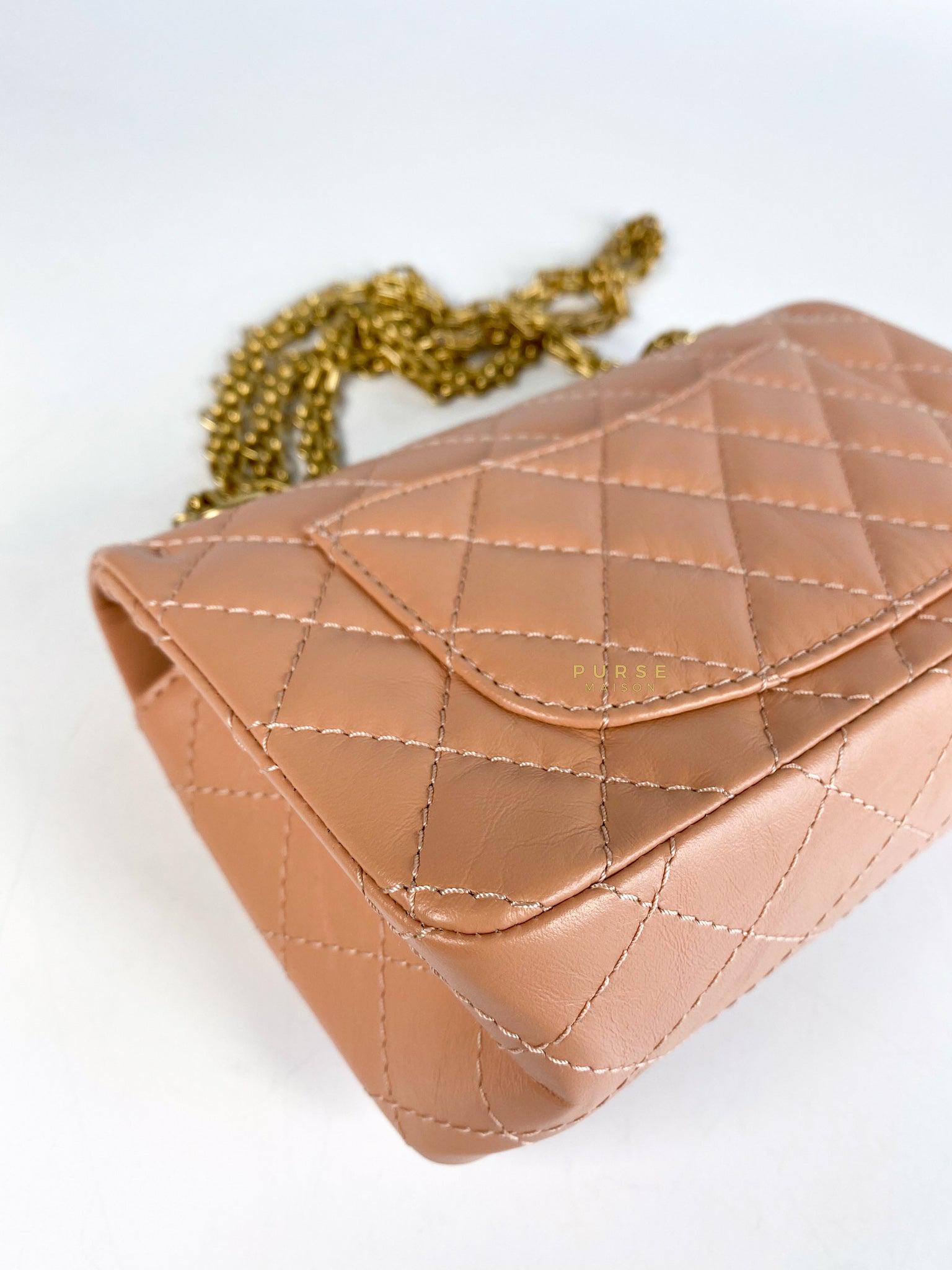 Chanel 2.55 Mini Reissue Salmon distressed calfskin & Aged Gold Hardware (Microchip)