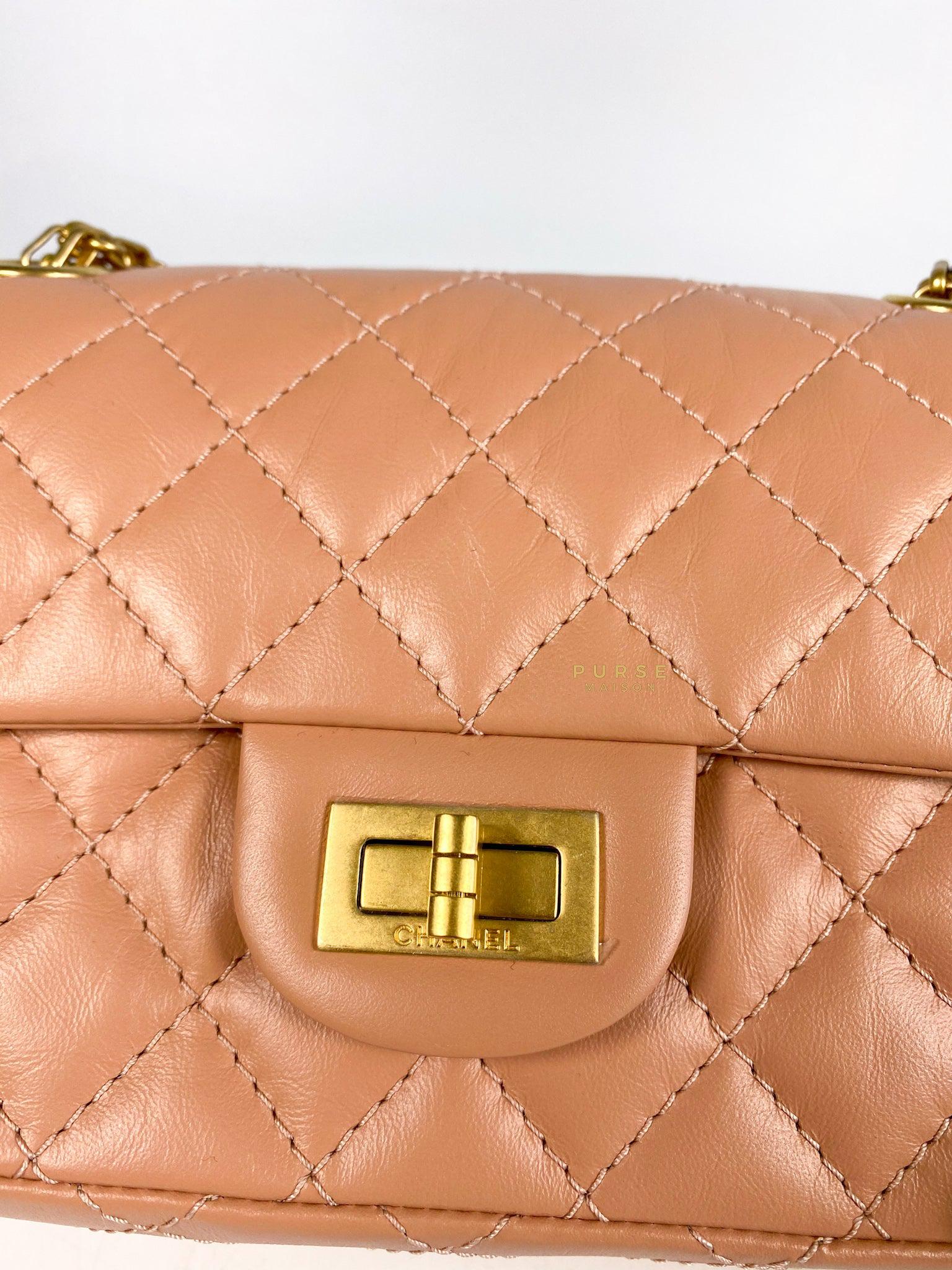 Chanel 2.55 Mini Reissue Salmon distressed calfskin & Aged Gold Hardware (Microchip)