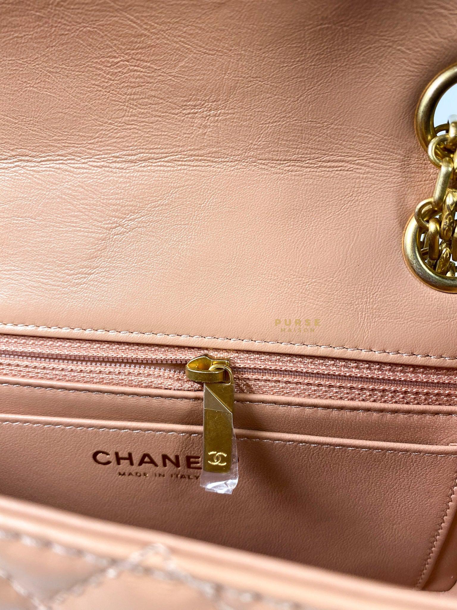 Chanel 2.55 Mini Reissue Salmon distressed calfskin & Aged Gold Hardware (Microchip)