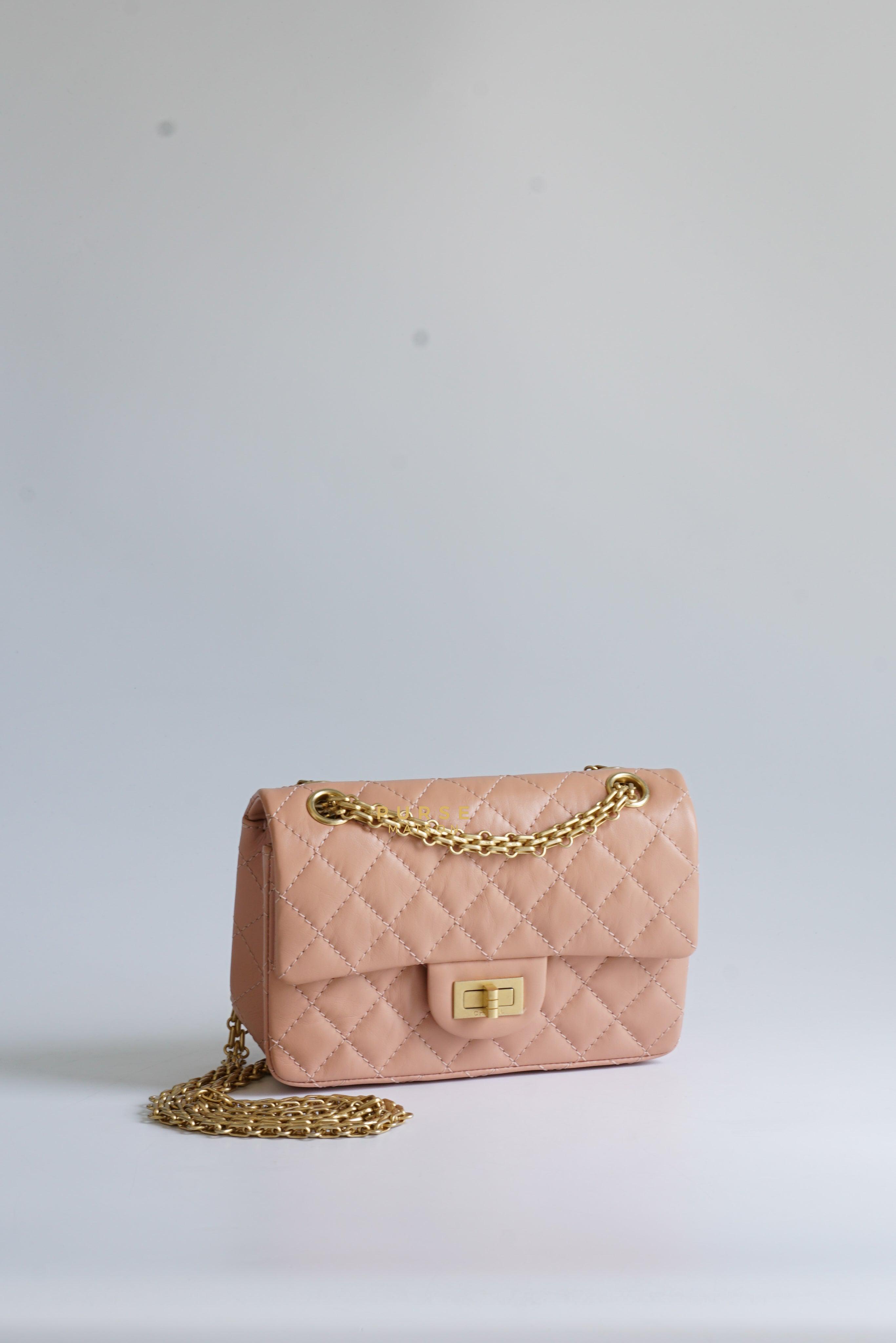 Chanel 2.55 Mini Reissue Salmon distressed calfskin & Aged Gold Hardware (Microchip)