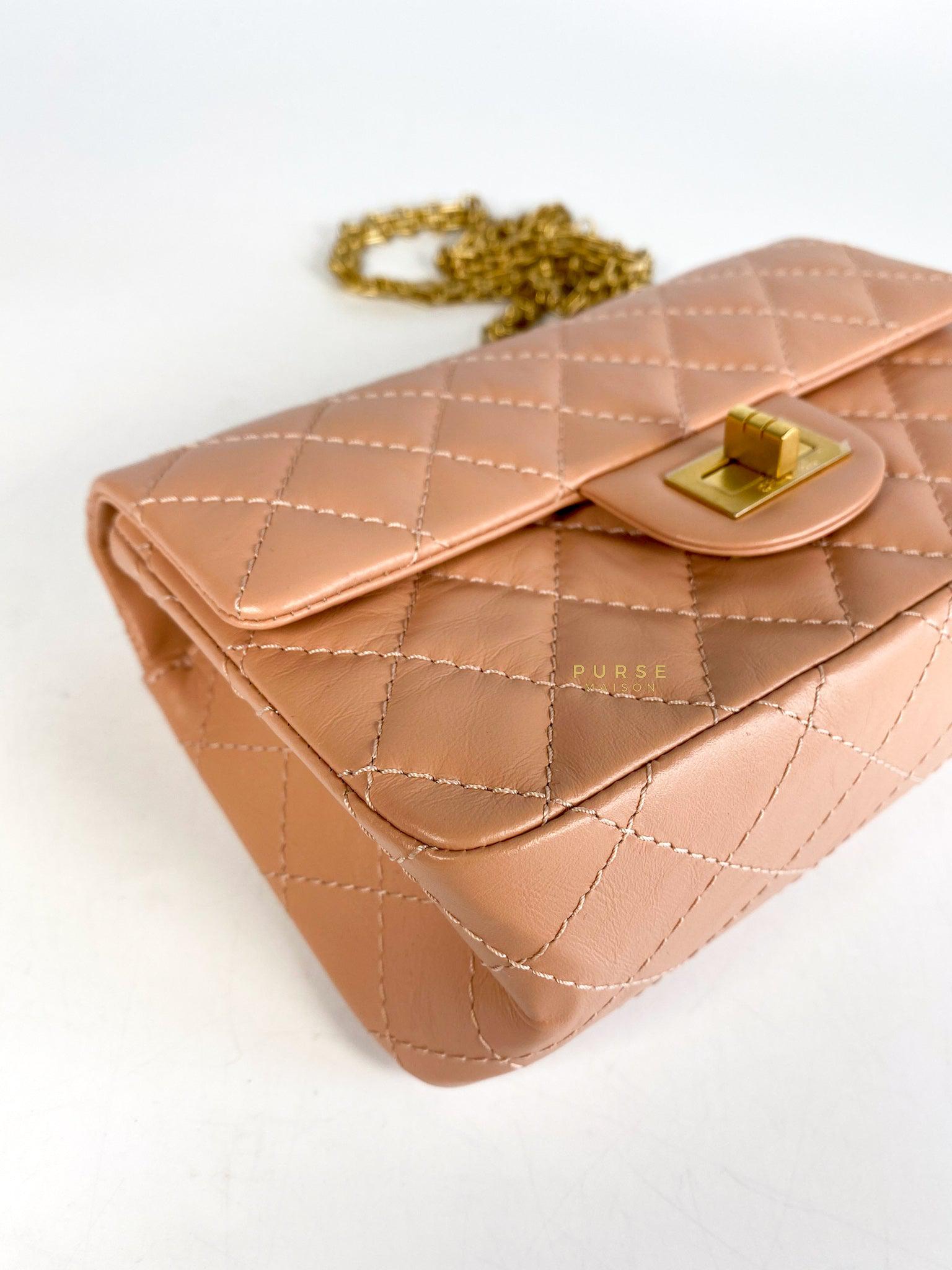 Chanel 2.55 Mini Reissue Salmon distressed calfskin & Aged Gold Hardware (Microchip)