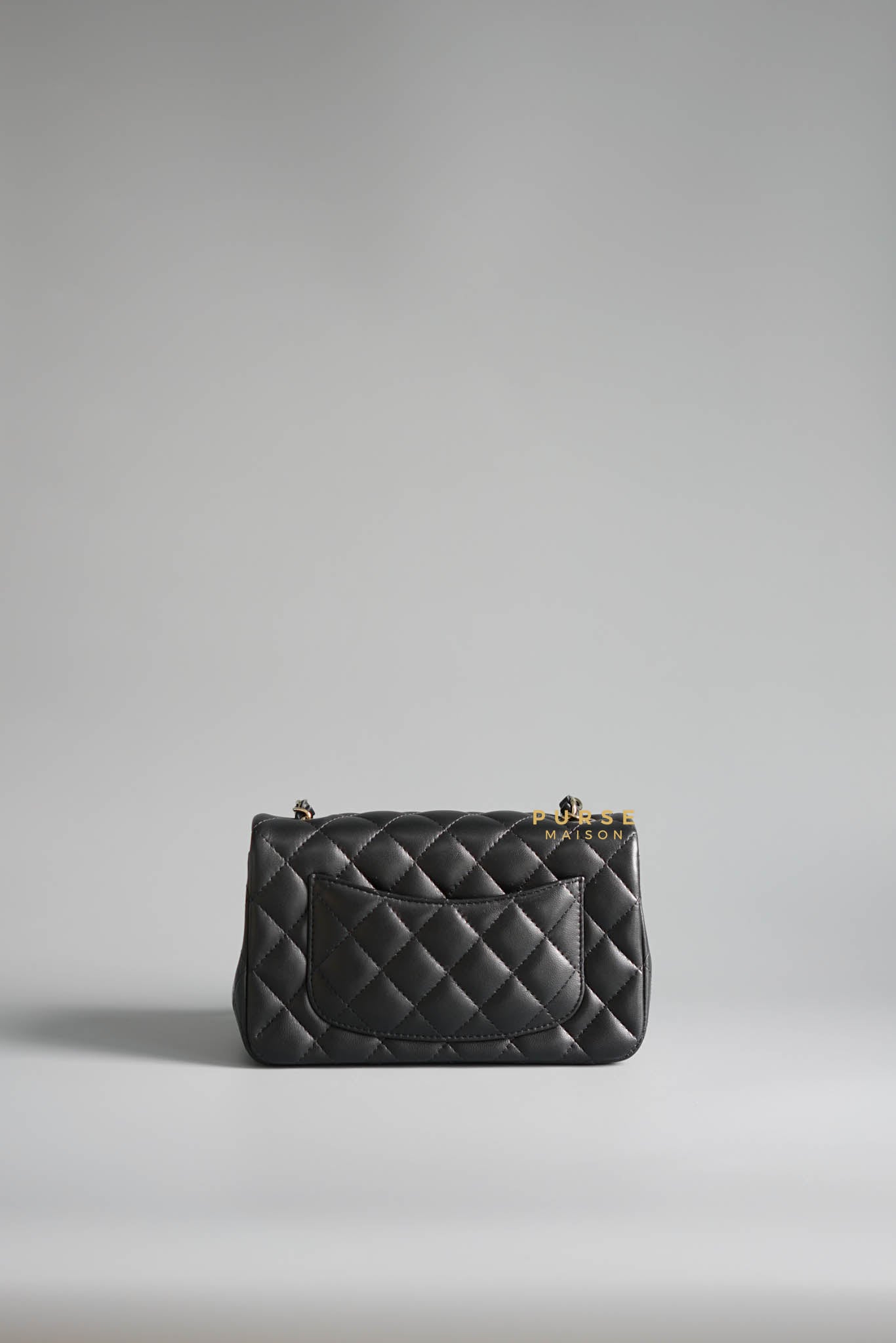 Chanel Black Mini Rectangle in Quilted Black Lambskin and Light Gold Hardware (Microchip) | Purse Maison Luxury Bags Shop