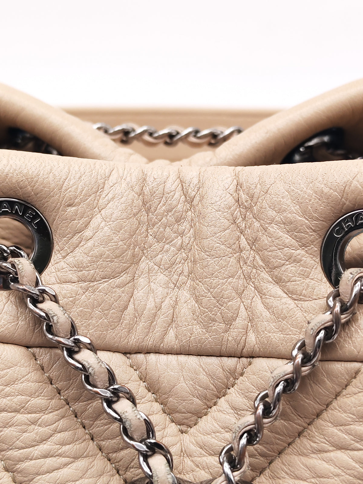 Chanel Chevron Drawstring Bucket Bag in Beige Calfskin Leather and Silver Hardware Series 23 | Purse Maison Luxury Bags Shop