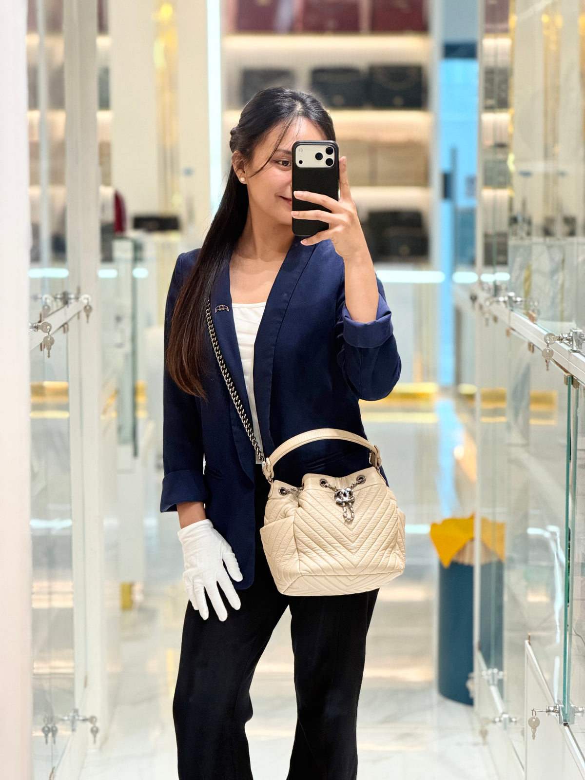 Chanel Chevron Drawstring Bucket Bag in Beige Calfskin Leather and Silver Hardware Series 23 | Purse Maison Luxury Bags Shop