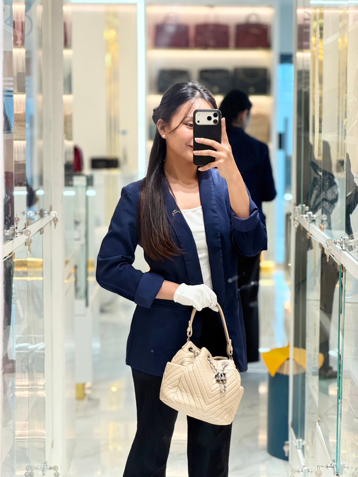 Chanel Chevron Drawstring Bucket Bag in Beige Calfskin Leather and Silver Hardware Series 23 | Purse Maison Luxury Bags Shop