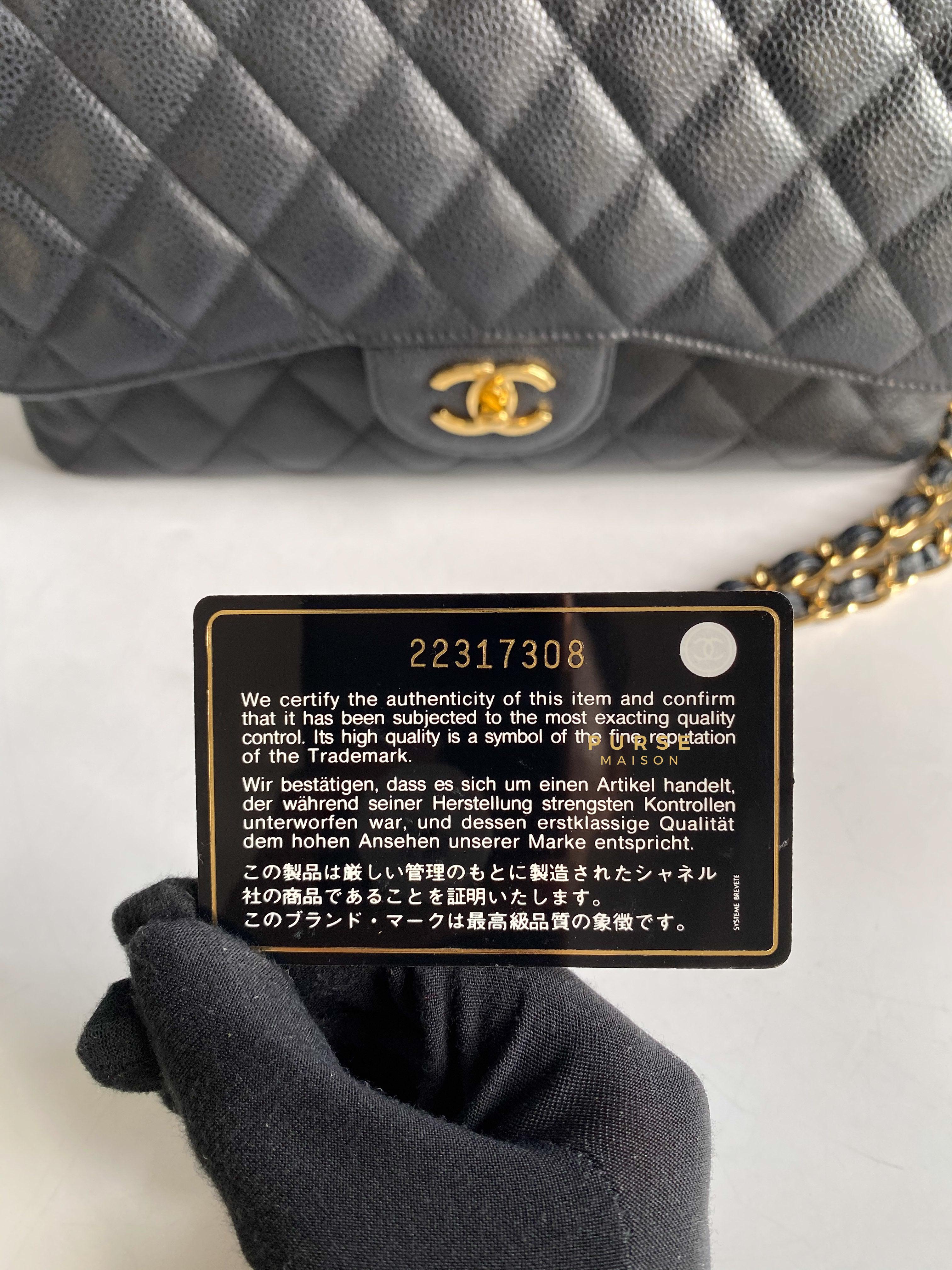 Chanel classic flap jumbo black caviar with hot sale gold hardware