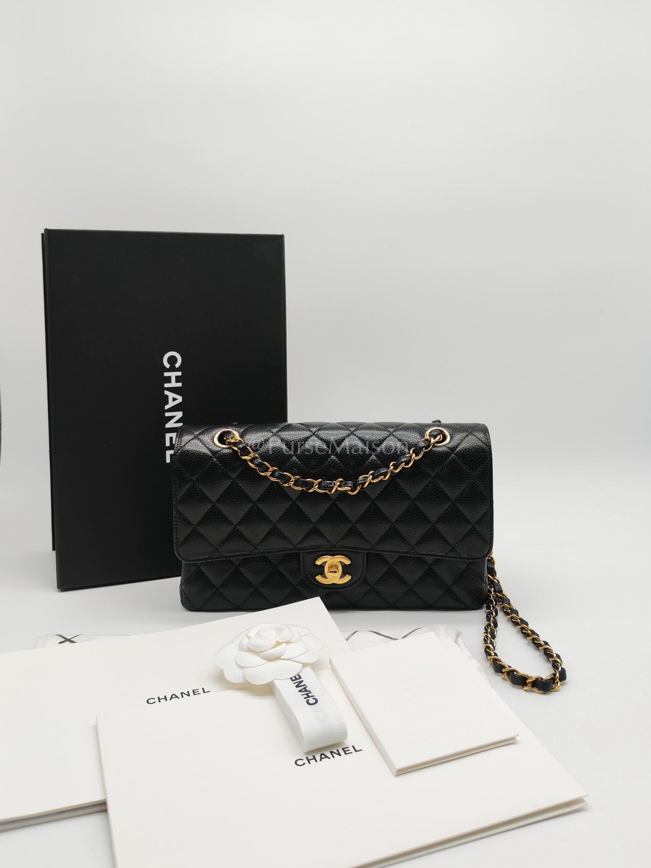 Chanel Classic Double Flap in Black Quilted Leather Caviar Leather and Gold Hardware (Microchip) | Purse Maison Luxury Bags Shop