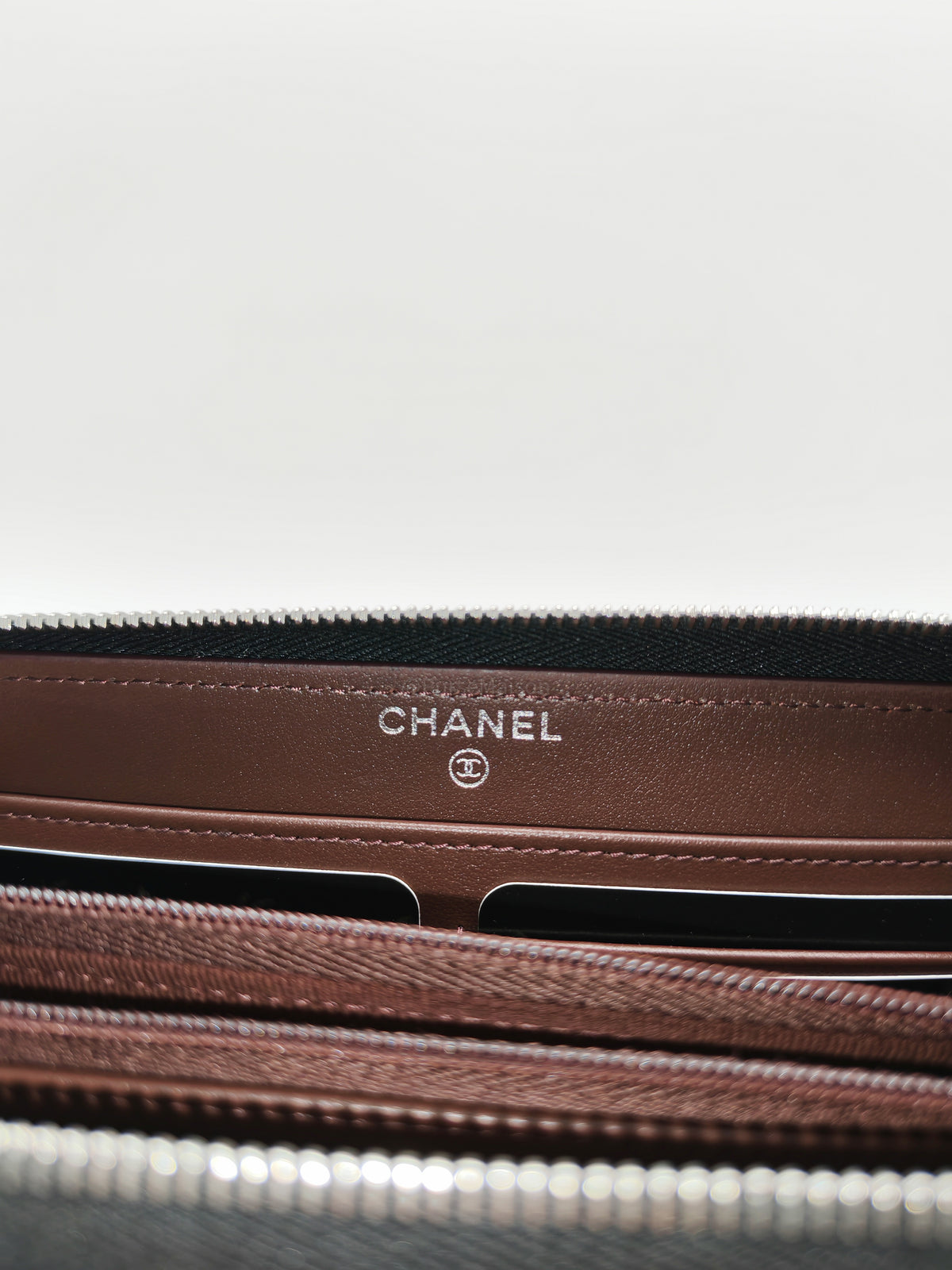 Chanel Classic Zip-Around Wallet in Black Caviar Leather and Silver Hardware Microchio (K1****0K) | Purse Maison Luxury Bags Shop