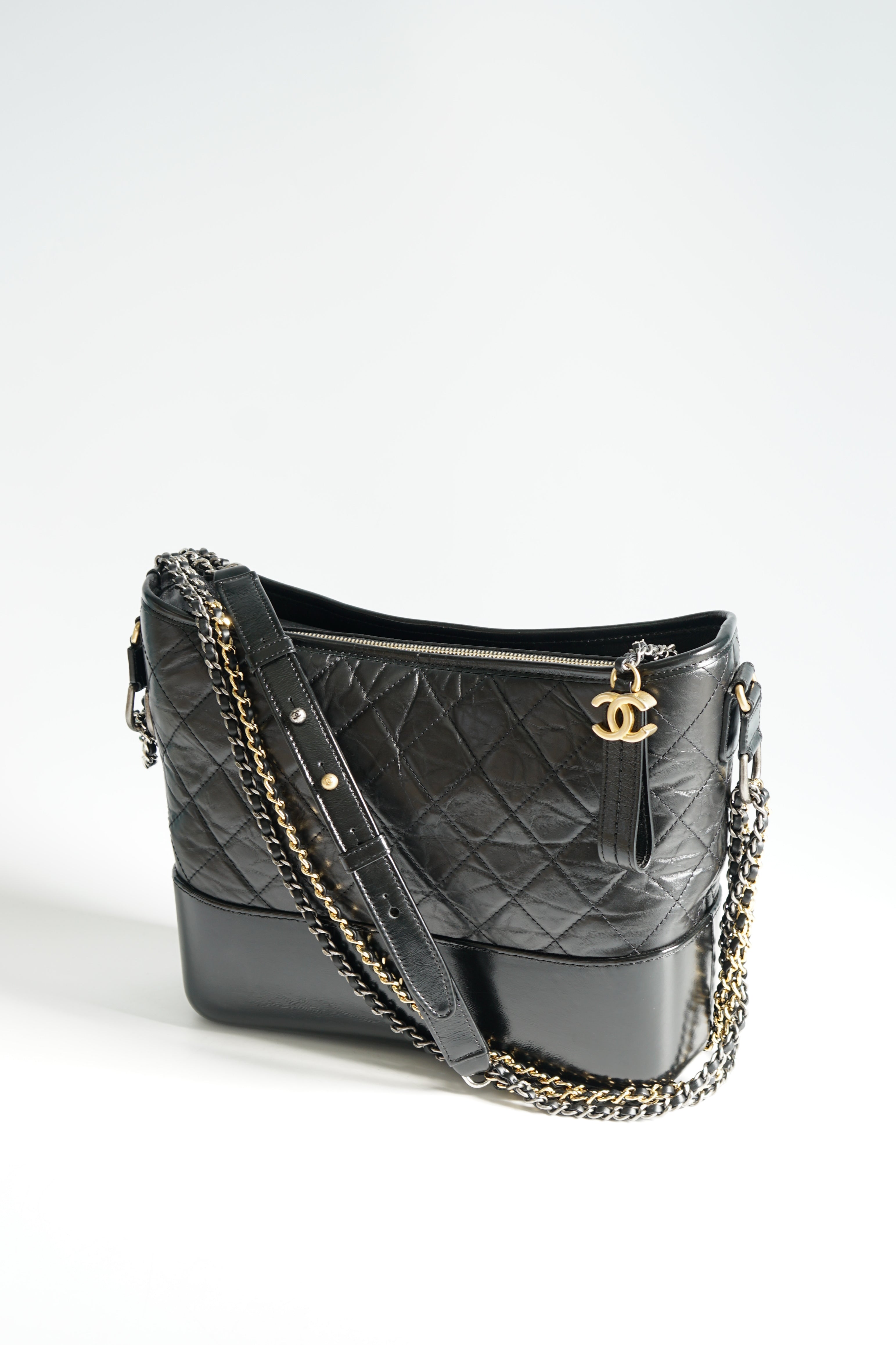 CHANEL Gabrielle 'Hobo' Bag in Aged White Quilted Leather and Black Leather  at 1stDibs