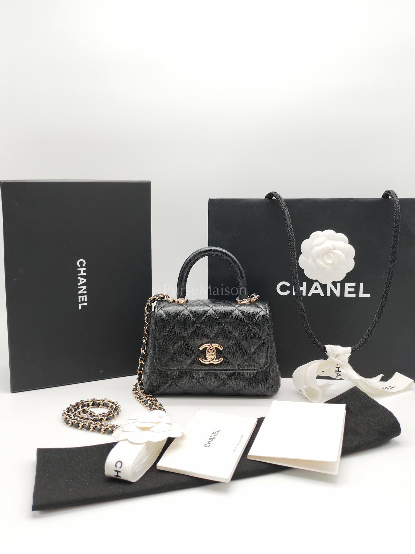 Chanel Mini Coco Handle in Black Quilted Caviar Leather and Light Gold Hardware Microchip | Purse Maison Luxury Bags Shop