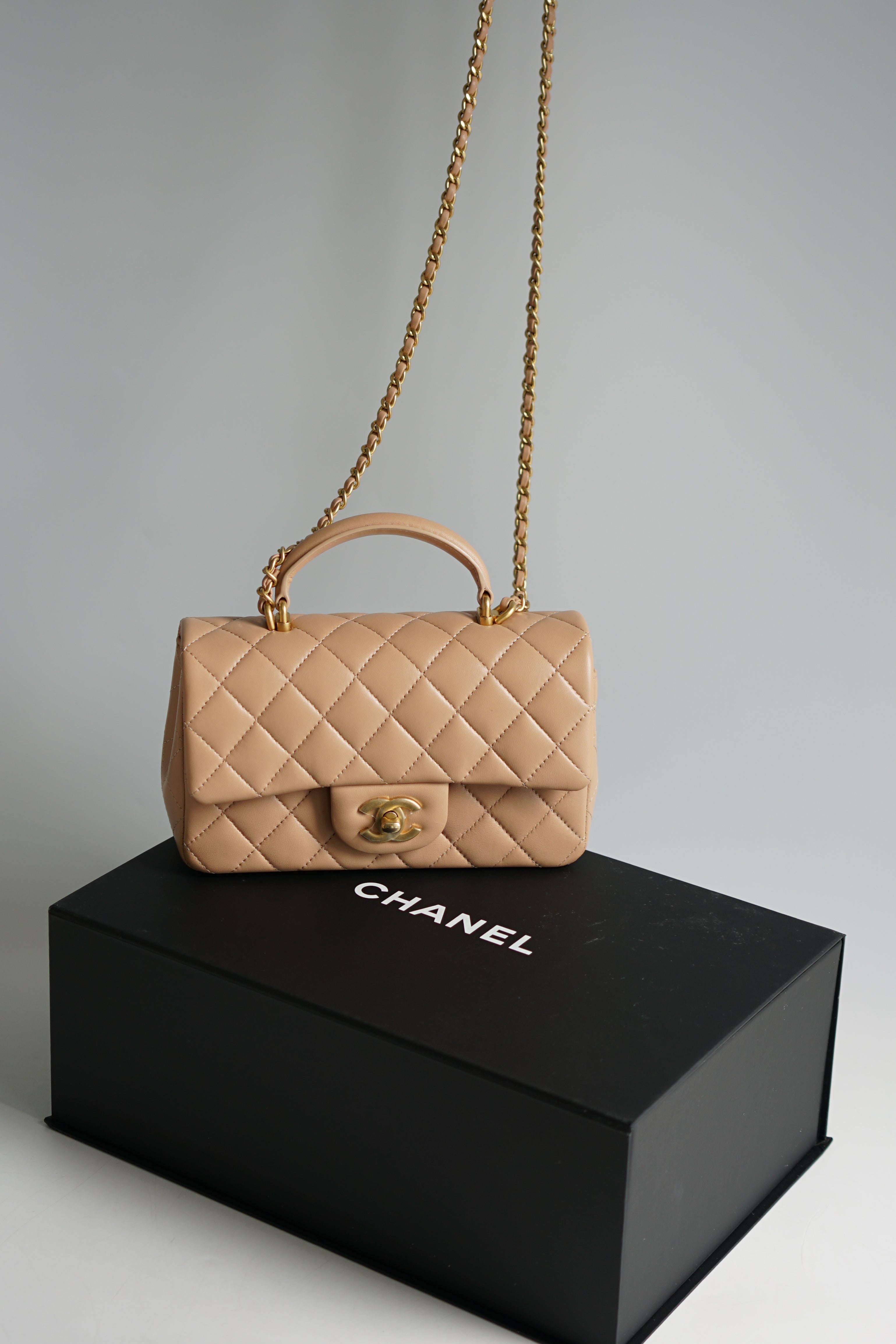 Chanel Mini Rectangle Top Handle 21A Beige Lambskin in Aged Gold Hardware (Microchip)