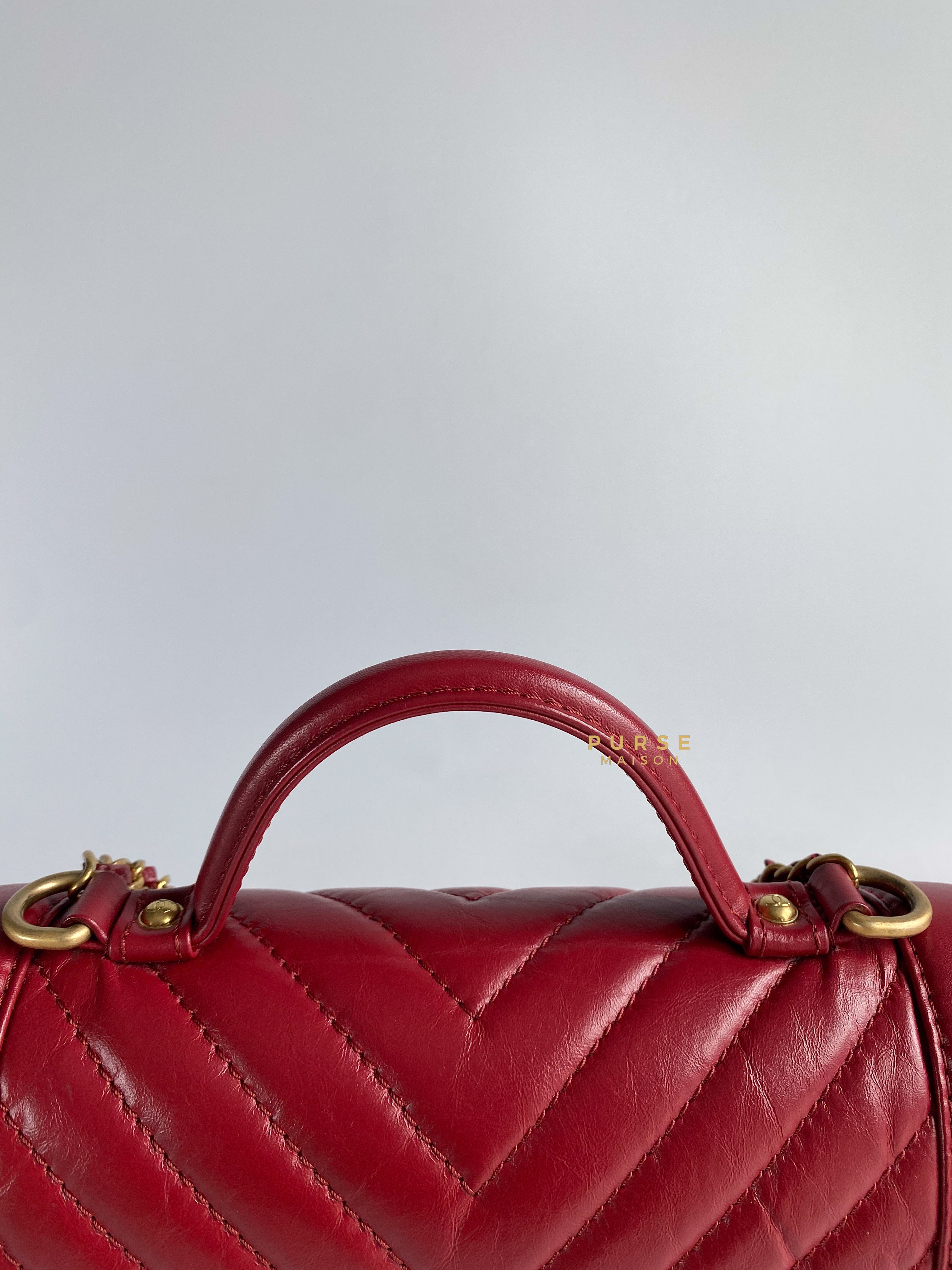 Chanel flap bag discount with top handle red