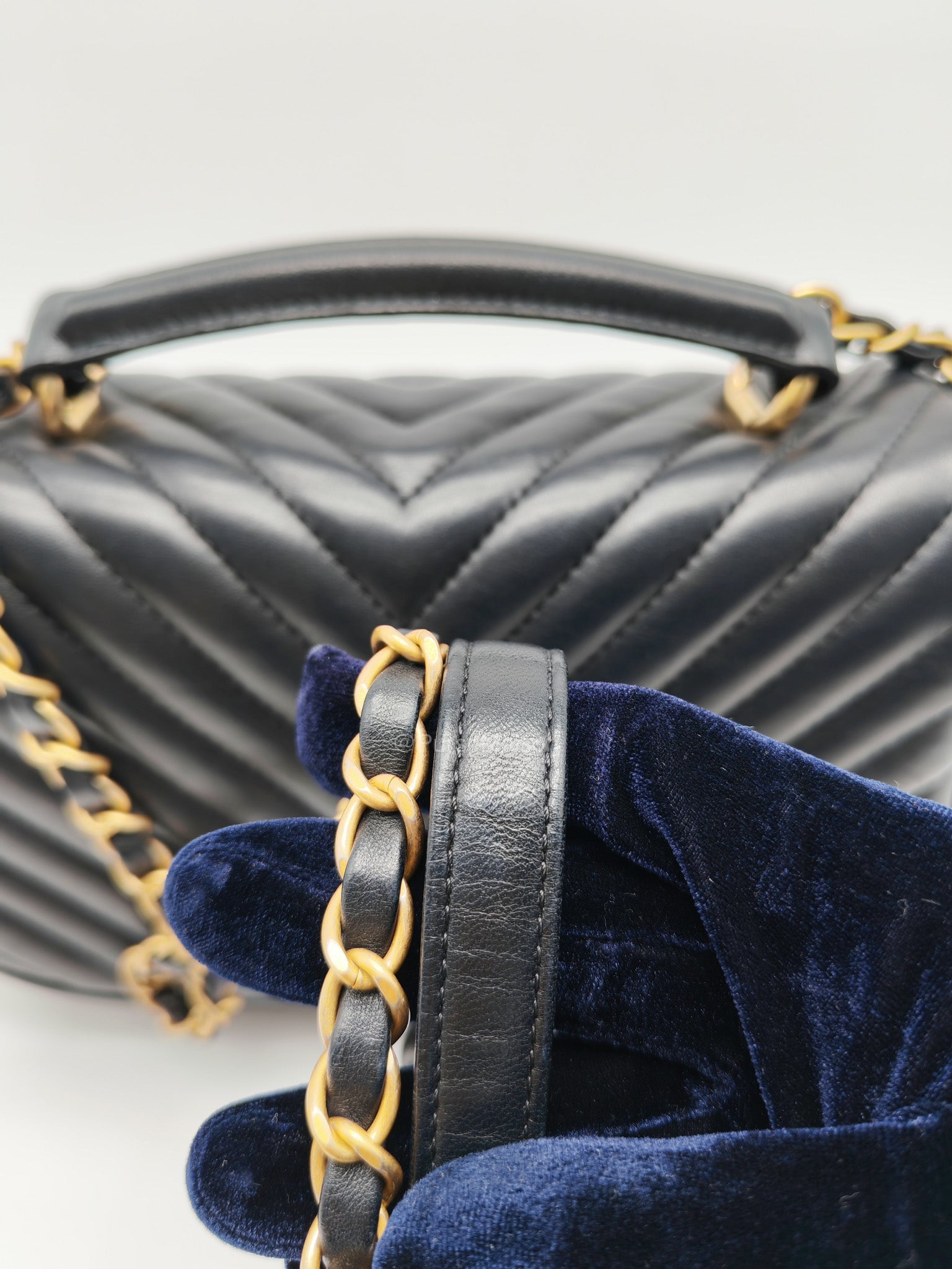 Chanel Reverse Chevron Top Handle Flap Bag in Black Quilted Lambskin Leather and Aged Gold Hardware Series 24 | Purse Maison Luxury Bags Shop