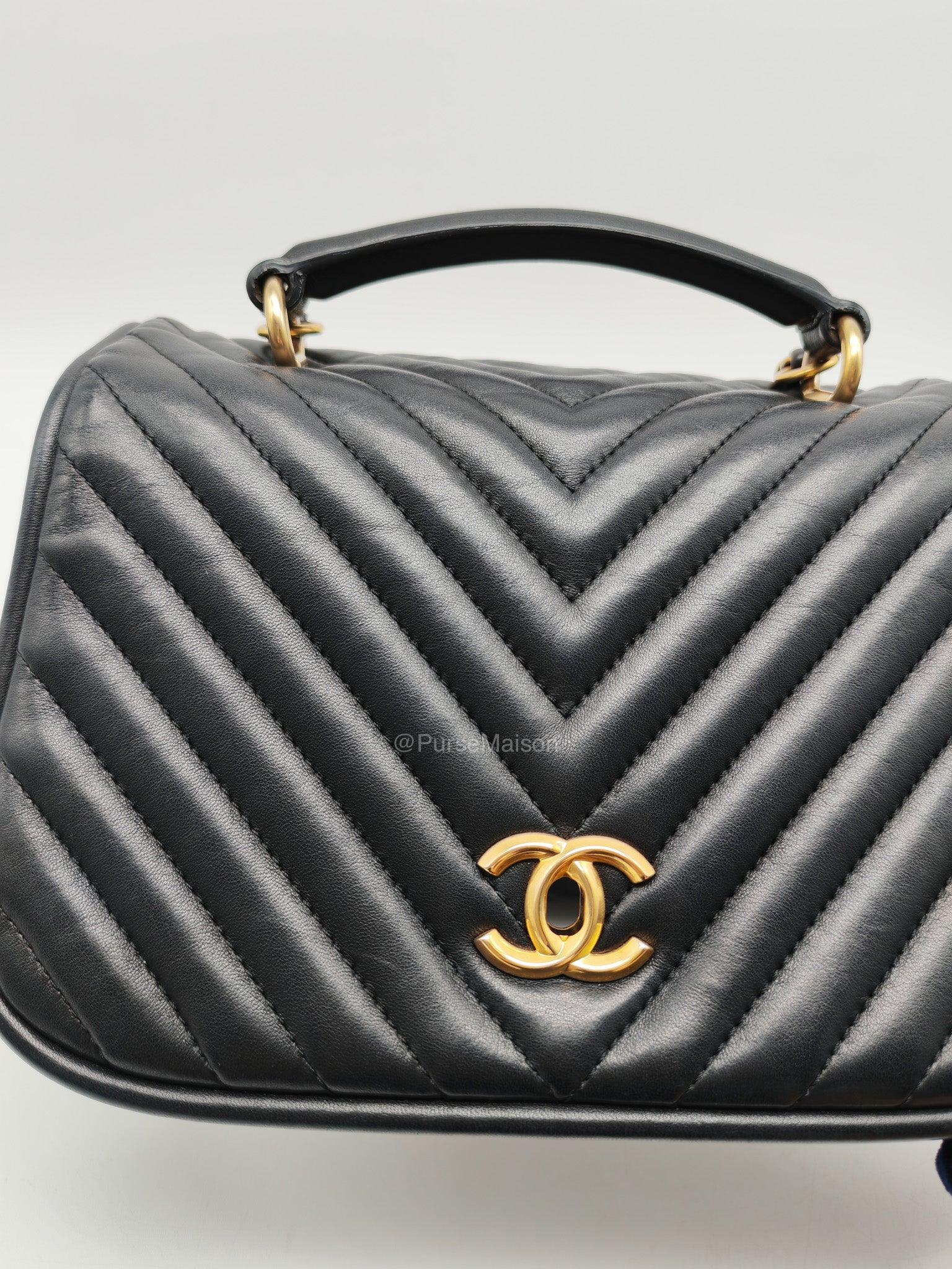 Chanel Reverse Chevron Top Handle Flap Bag in Black Quilted Lambskin Leather and Aged Gold Hardware Series 24 | Purse Maison Luxury Bags Shop