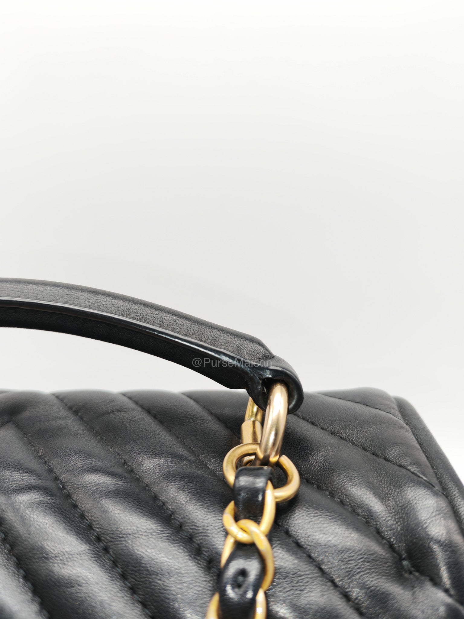 Chanel Reverse Chevron Top Handle Flap Bag in Black Quilted Lambskin Leather and Aged Gold Hardware Series 24 | Purse Maison Luxury Bags Shop