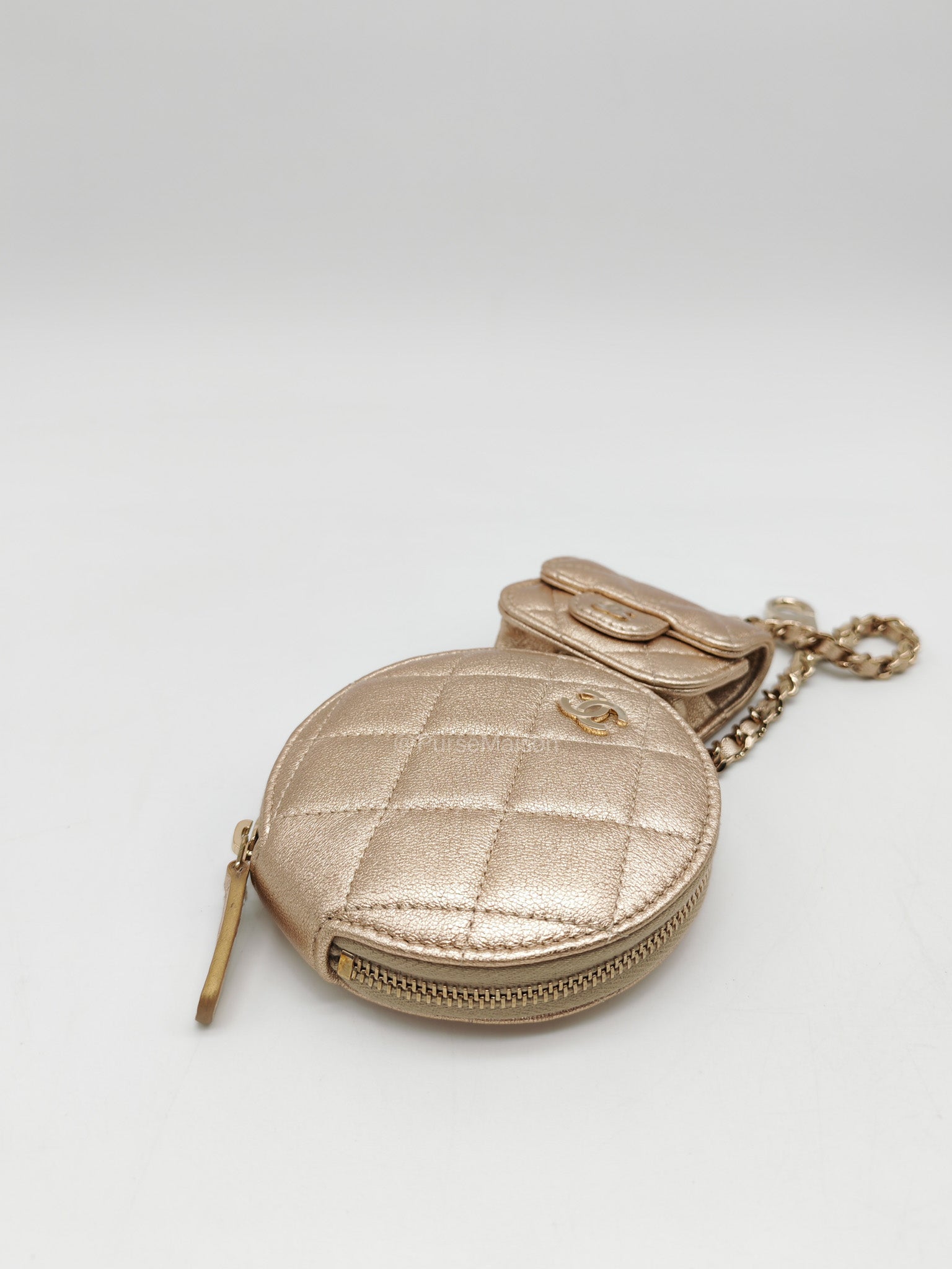 Chanel Round Clip-on Coin Purse and Airpods Case Set in Metallic Gold Quilted Lambskin Leather and Light Gold Hardware Microchip | Purse Maison Luxury Bags Shop