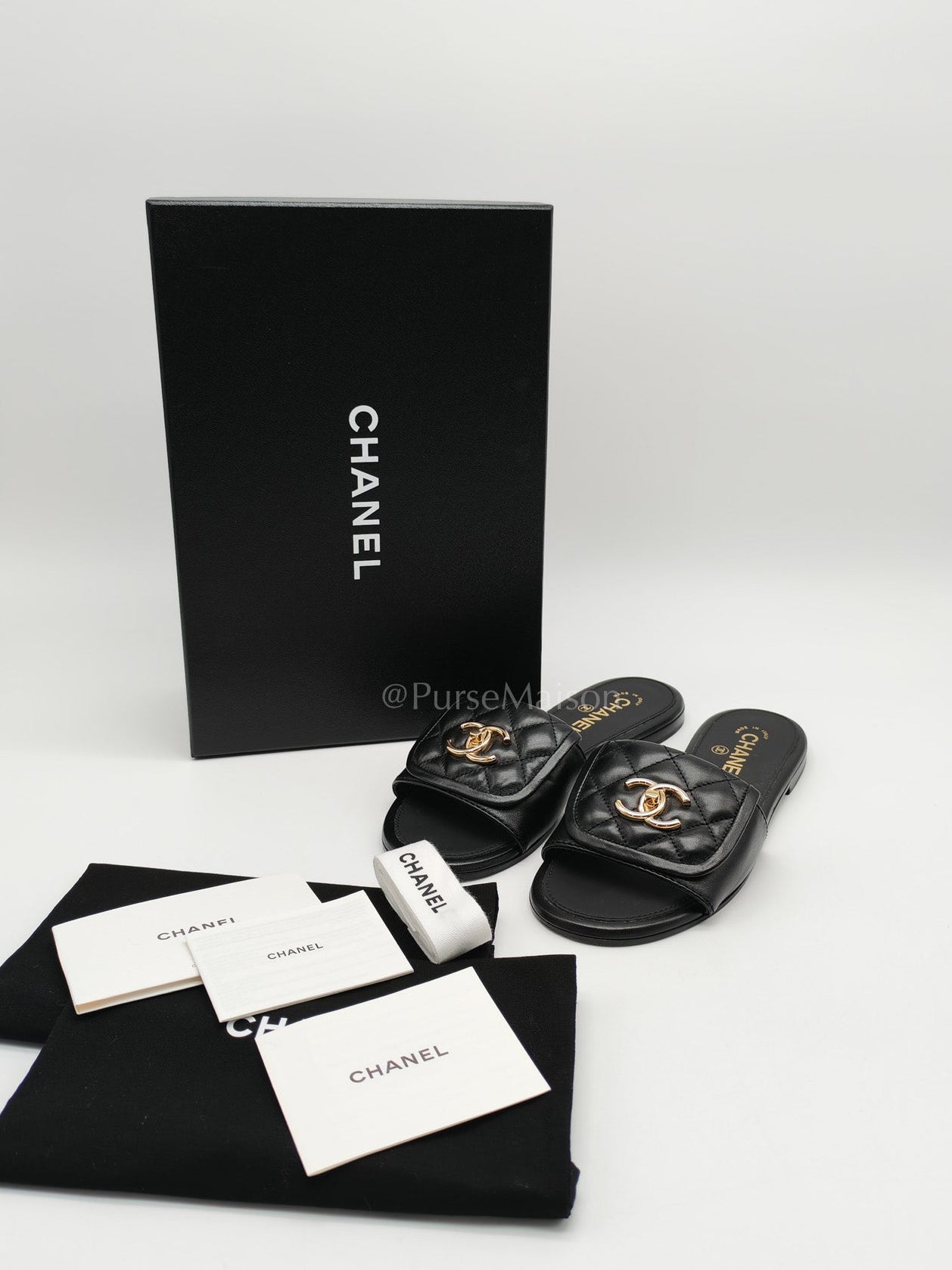 Chanel Turnlock Flat Mule Sandals in Black Quilted Lambskin Leather Size 37.5 EU(24cm) | Purse Maison Luxury Bags Shop