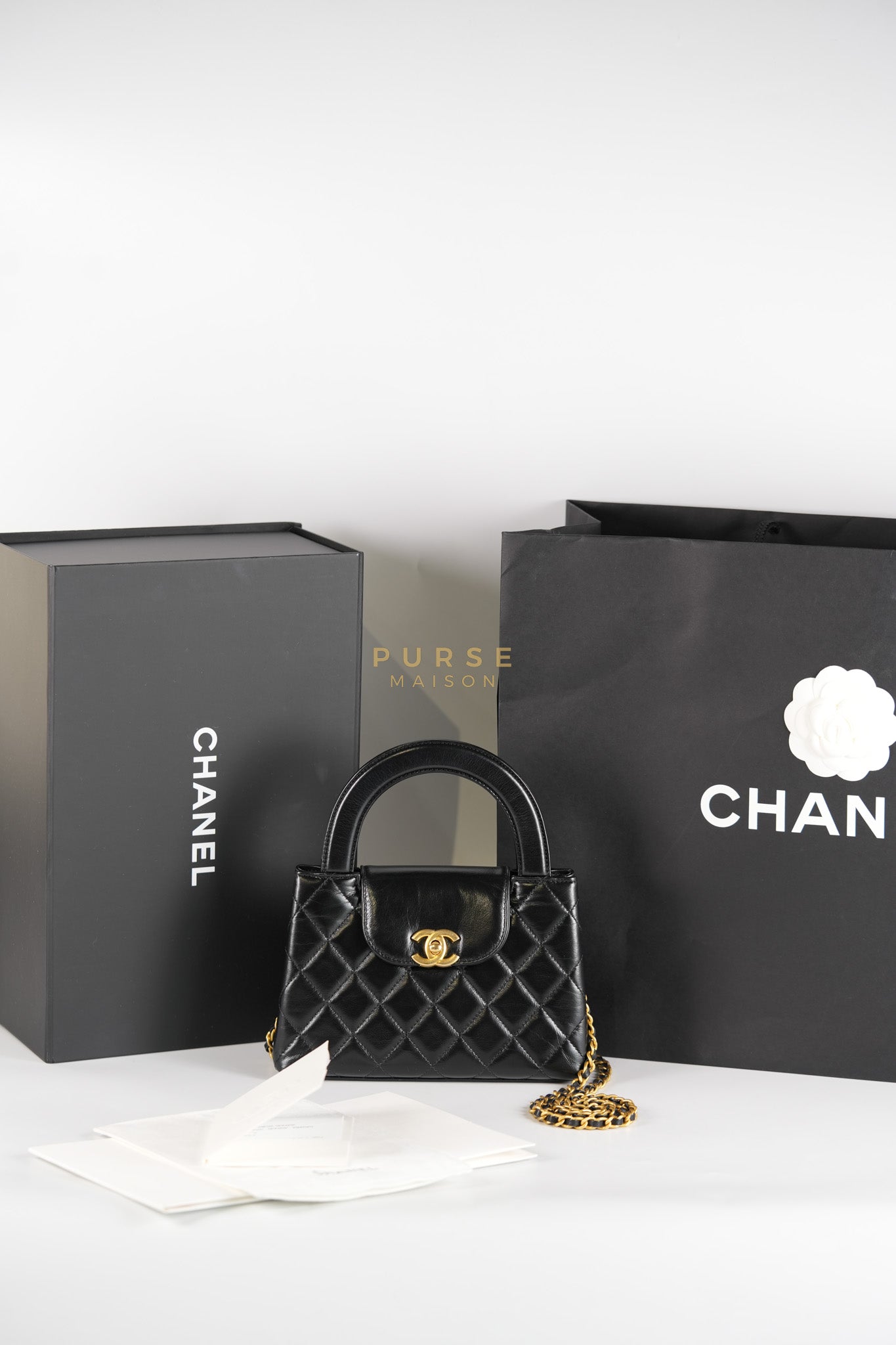 Mini Kelly Top Handle Bag in Black Quilted Calfskin Leather & Gold Hardware Microchip | Purse Maison Luxury Bags Shop