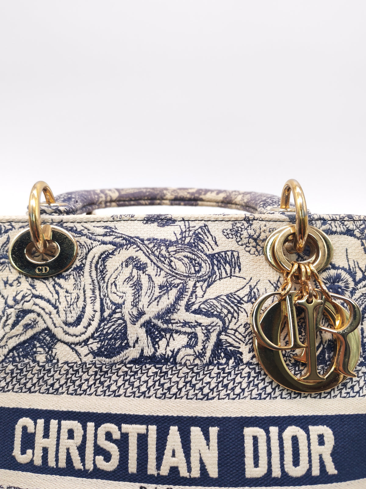 Christian Dior Lady D-Lite Medium in Navy Blue Toile de Jouy Embroidery Canvas and Light Gold Hardware | Purse Maison Luxury Bags Shop