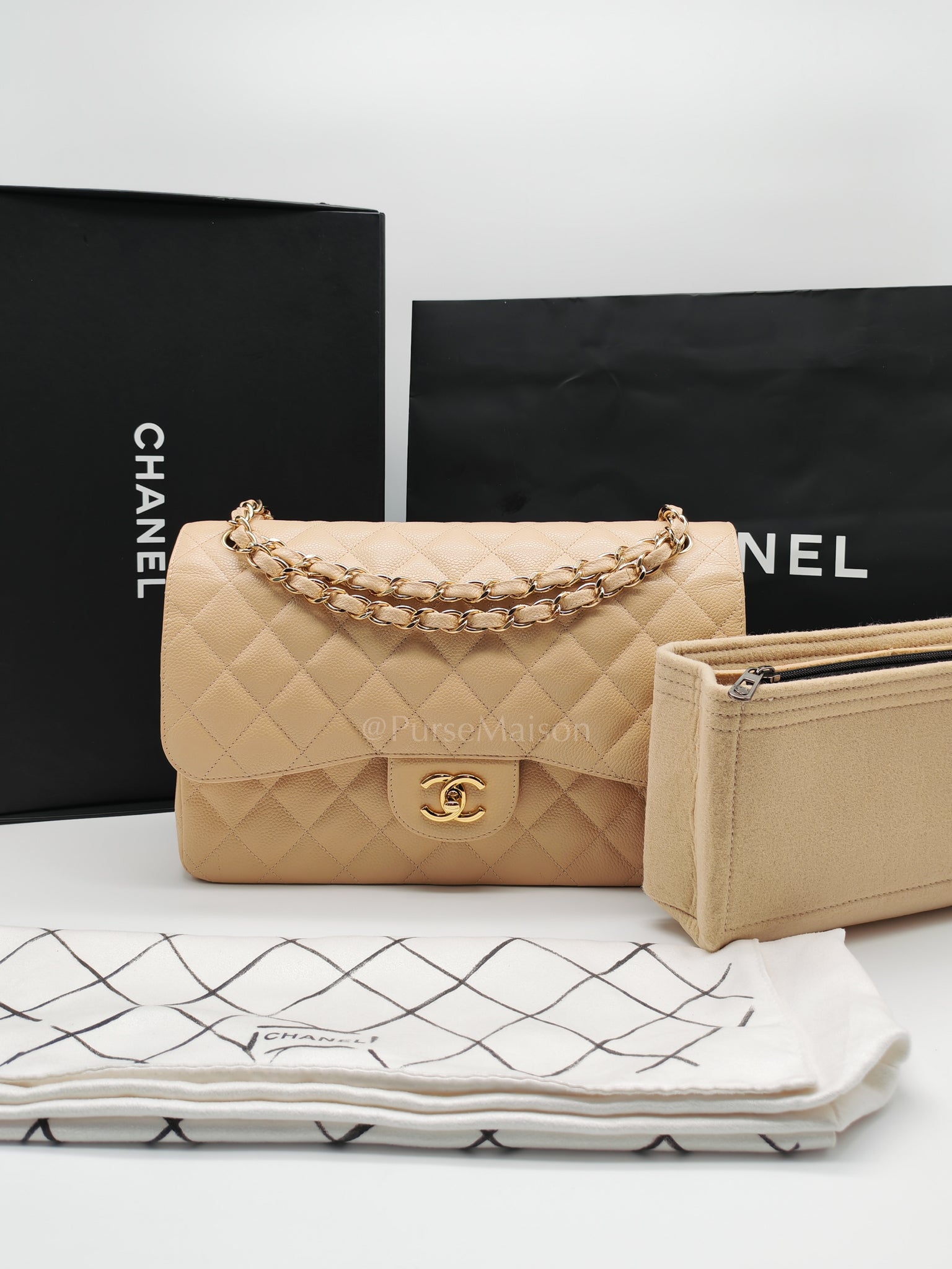 Classic Double Flap Jumbo Beige Caviar Leather on Gold Hardware (Series 19) | Purse Maison Luxury Bags Shop