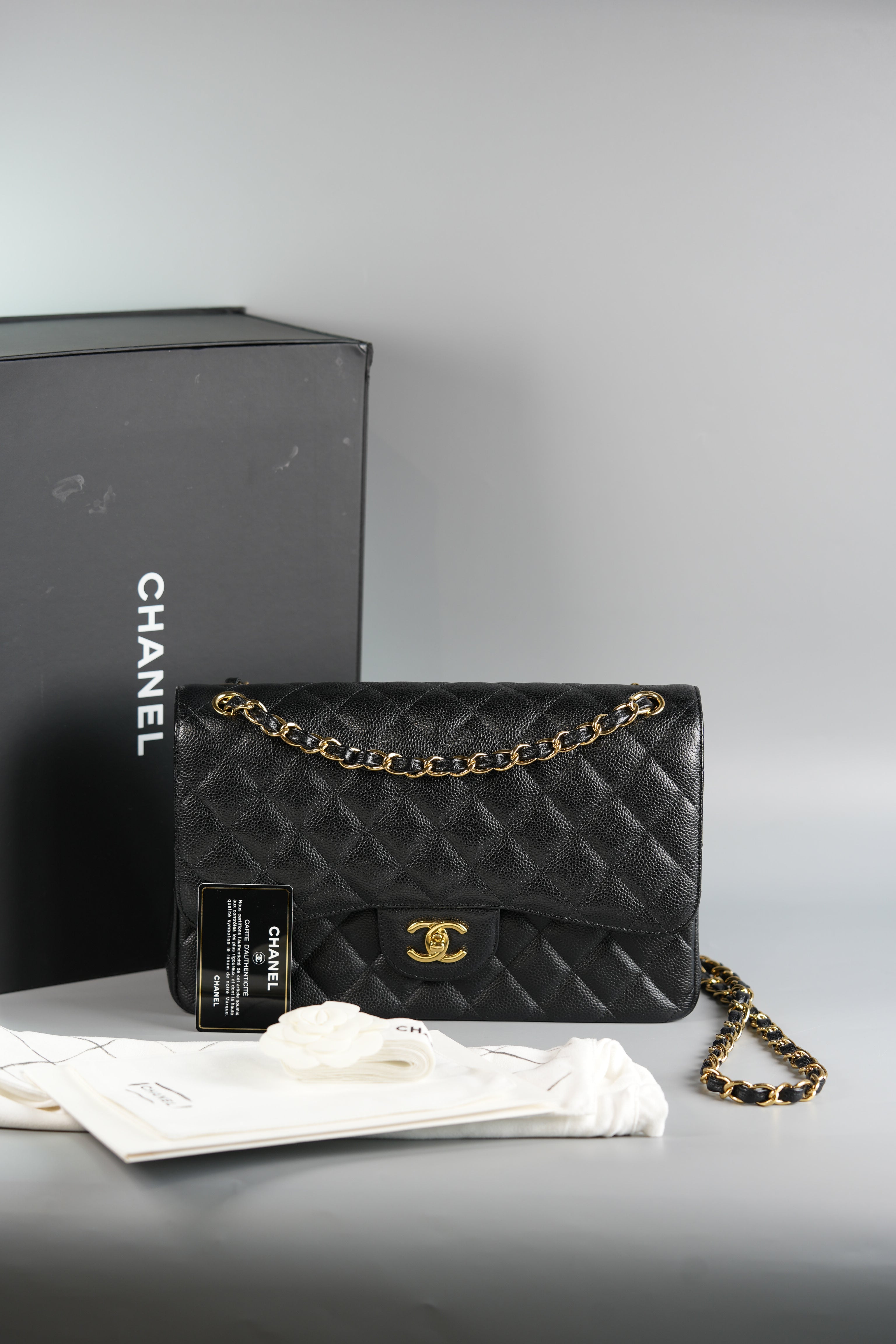 Classic Double Flap Jumbo Black Caviar Leather and Gold Hardware Series 23 | Purse Maison Luxury Bags Shop